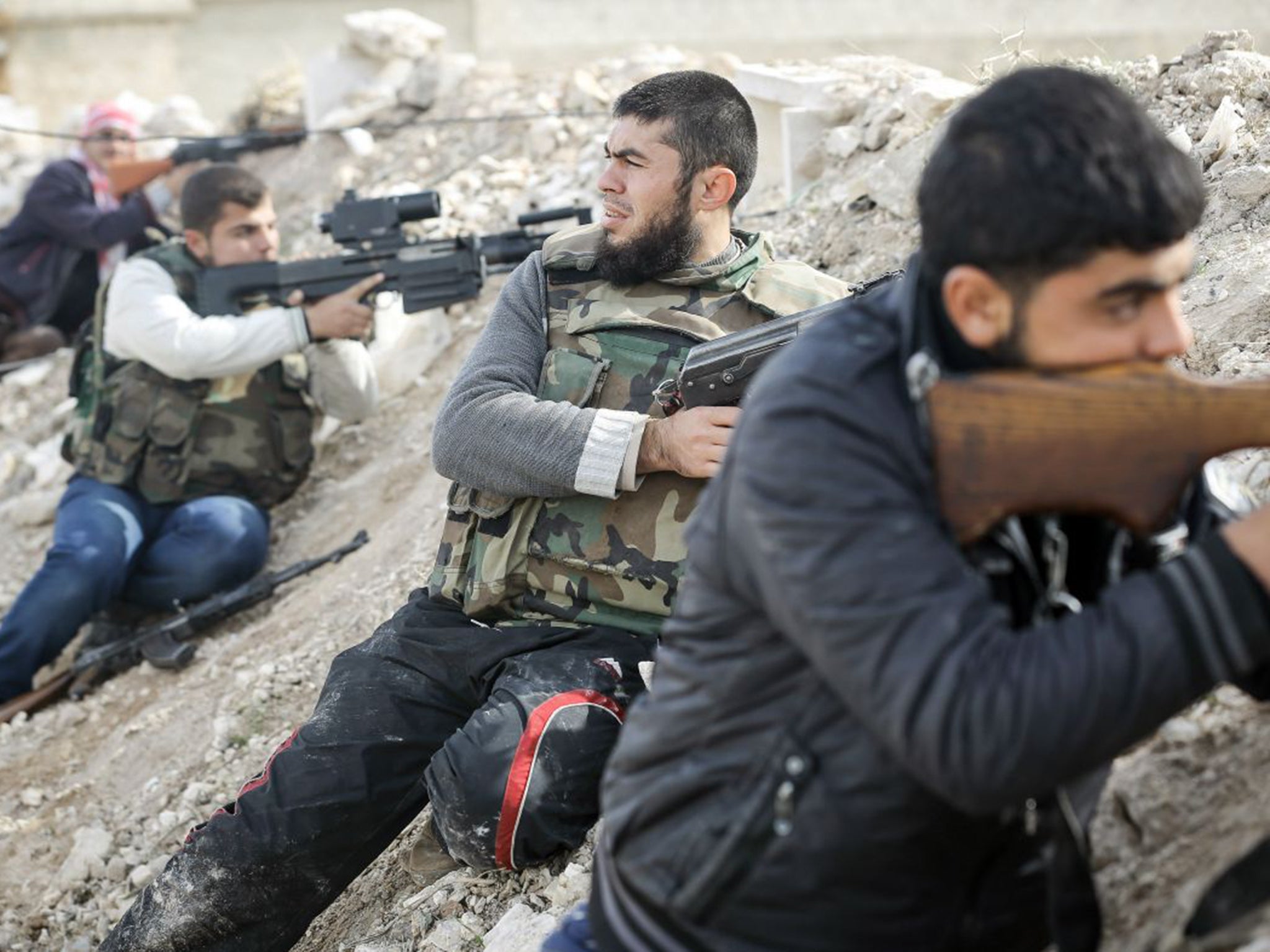 Syrian rebels return fire at Syrian army positions south of the highway town of Maraat al-Numan