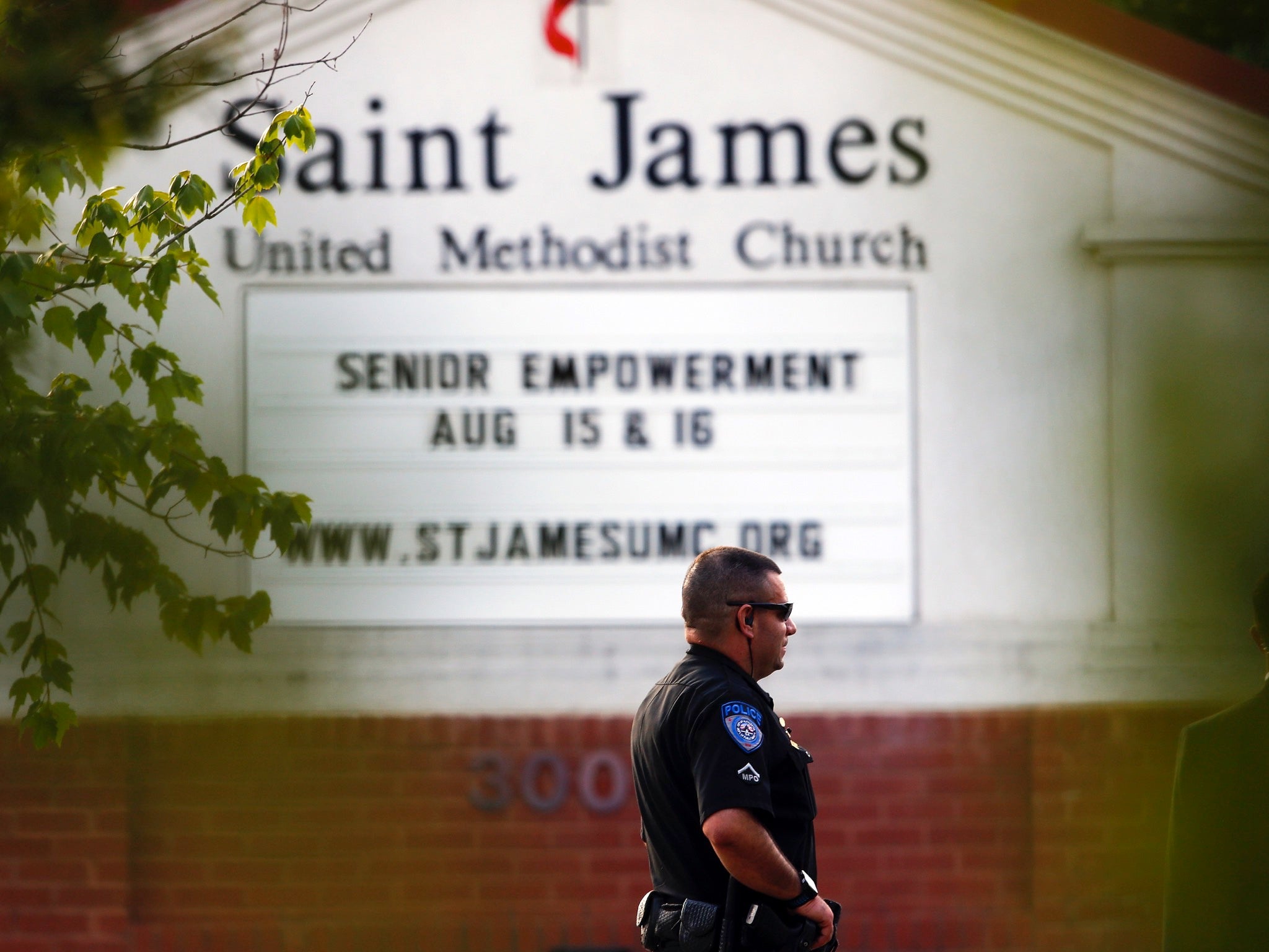 A police officer at the service in Georgia