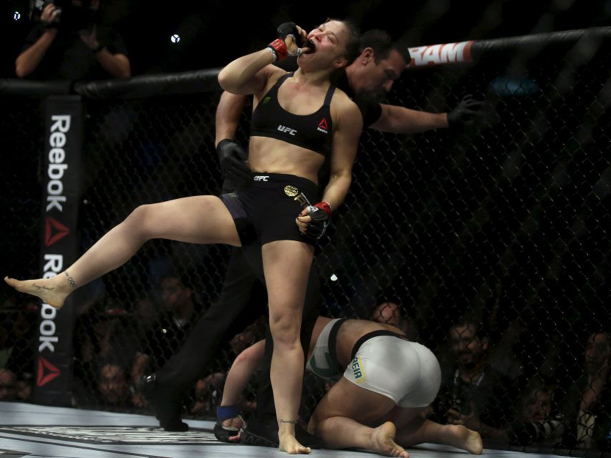 Rousey celebrates after victory
