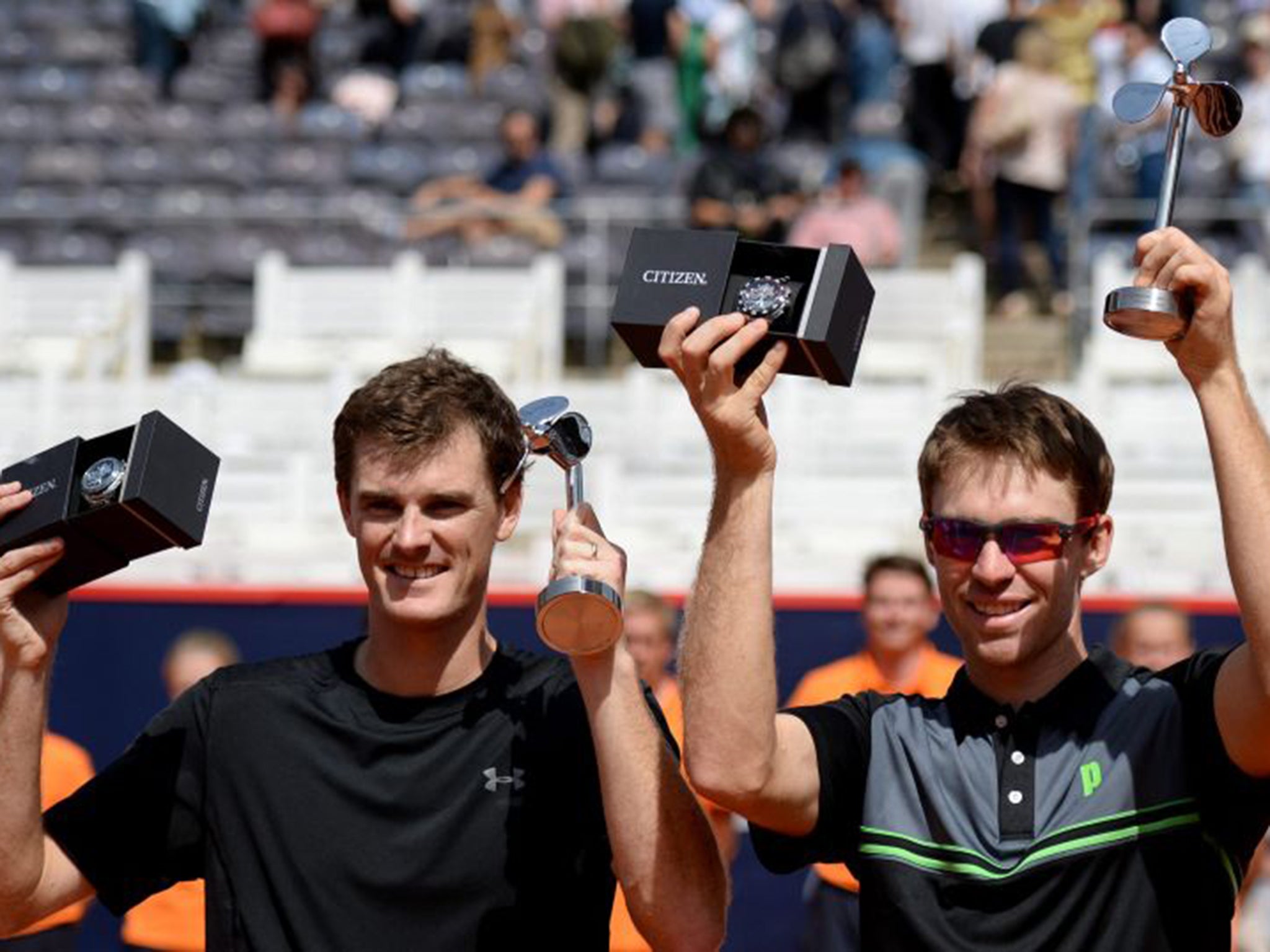 Jamie Murray, left, with doubles partner John Peers after their victory in Germany