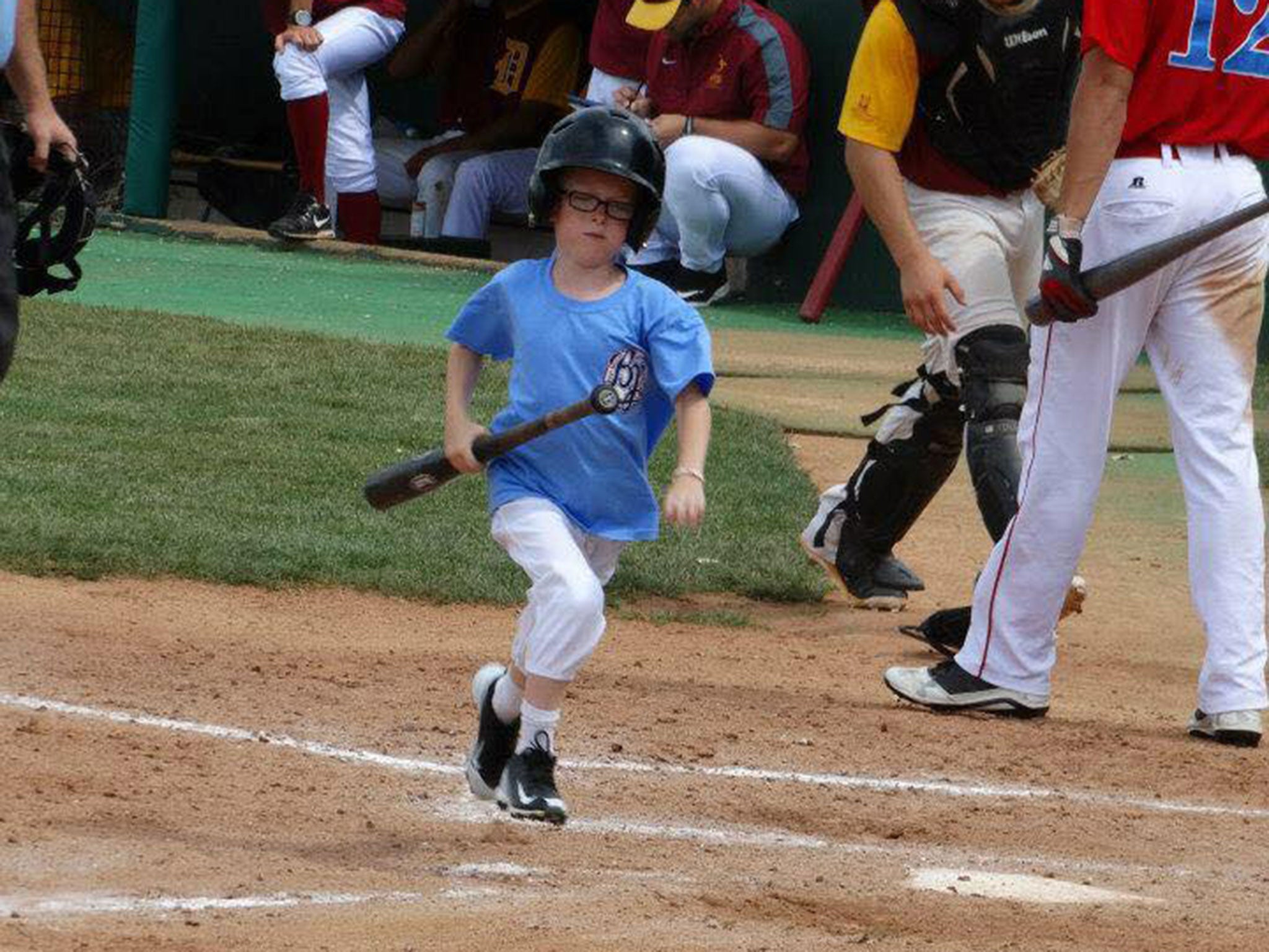 Nine-year-old Kaiser was a bat boy for the Kansas team