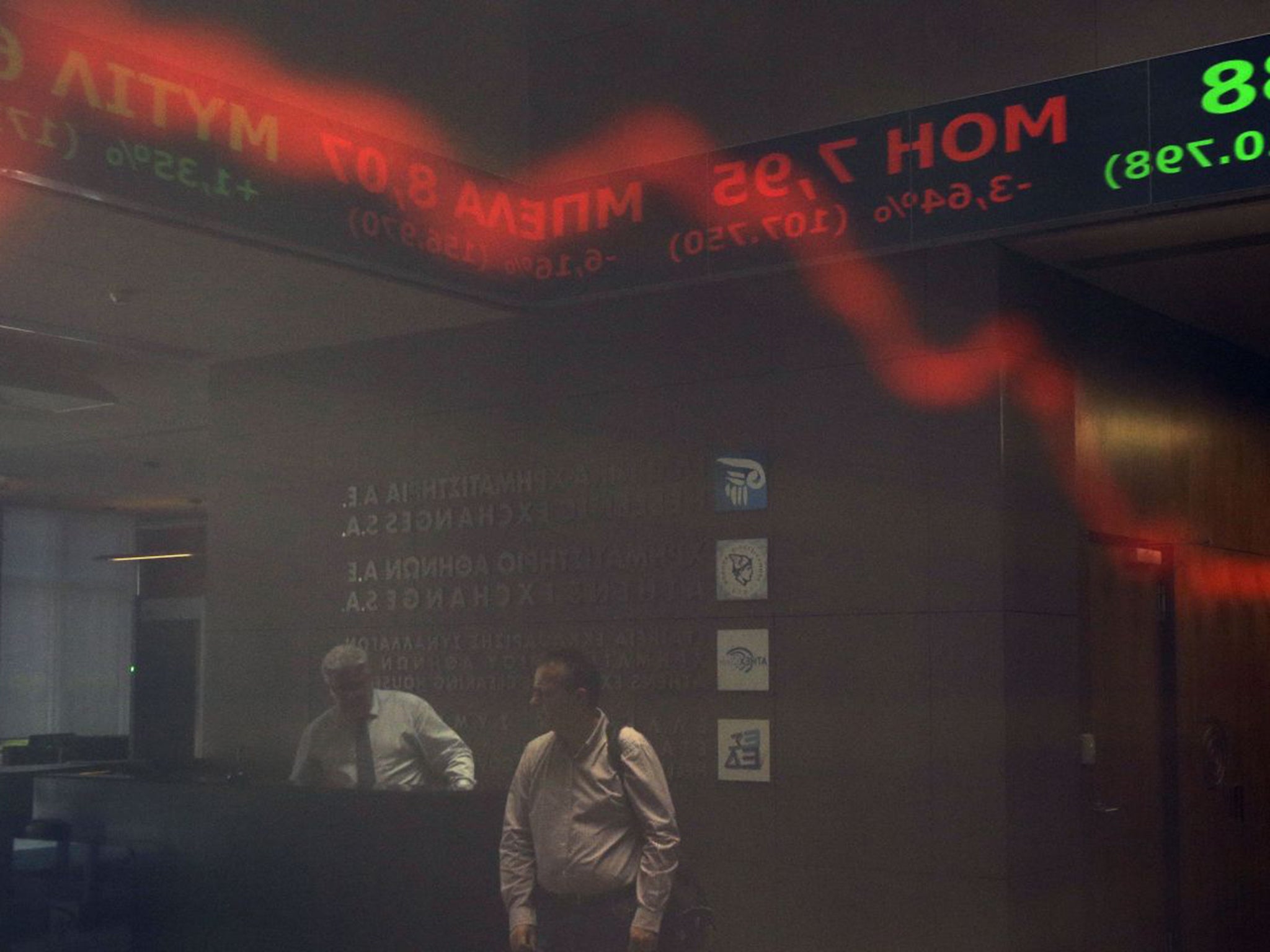 The Athens Stock Exchange slid by 22.8 per cent on opening Monday