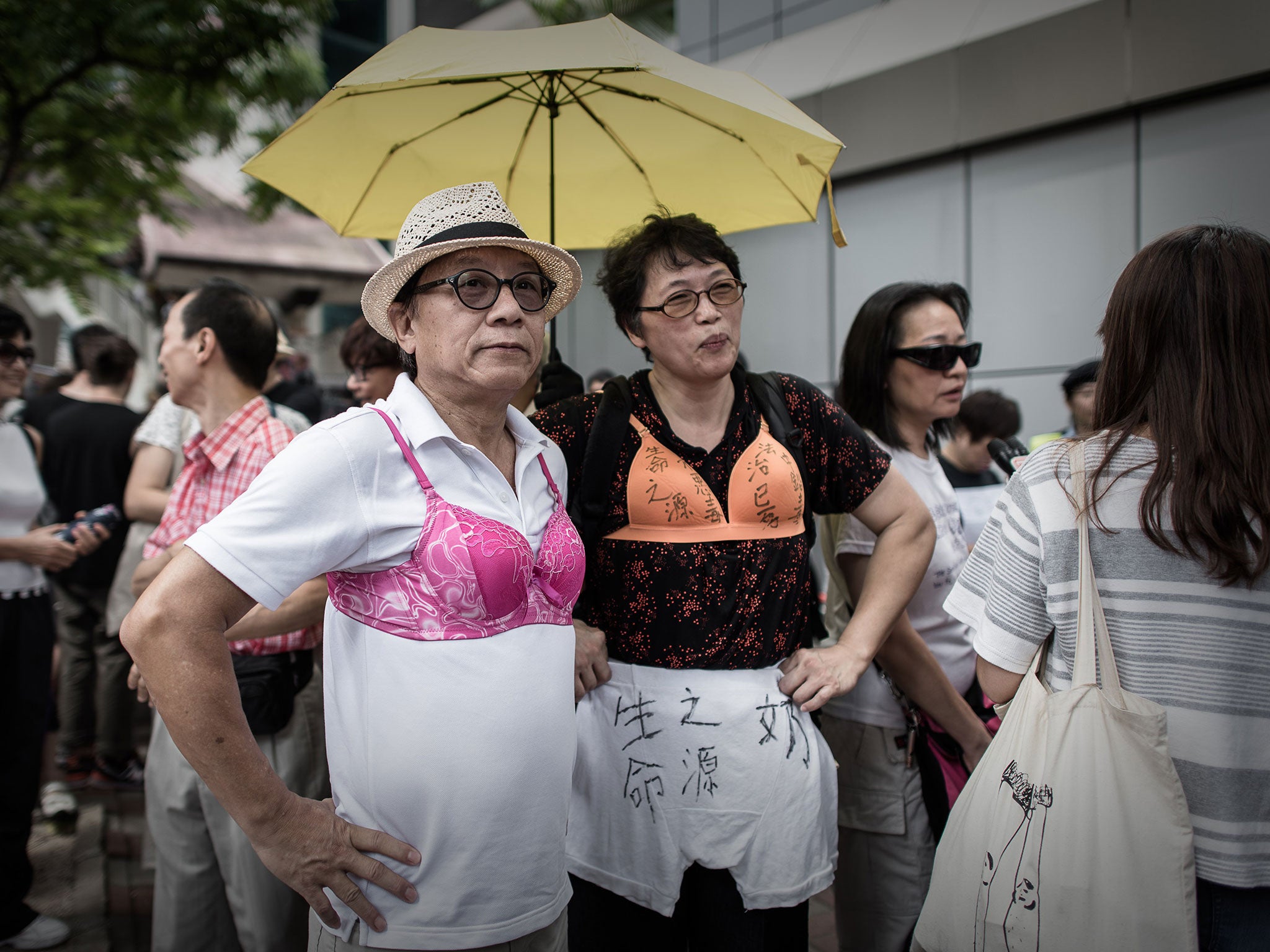 Men and women in Hong Kong have worn bras to protest the judge's decision