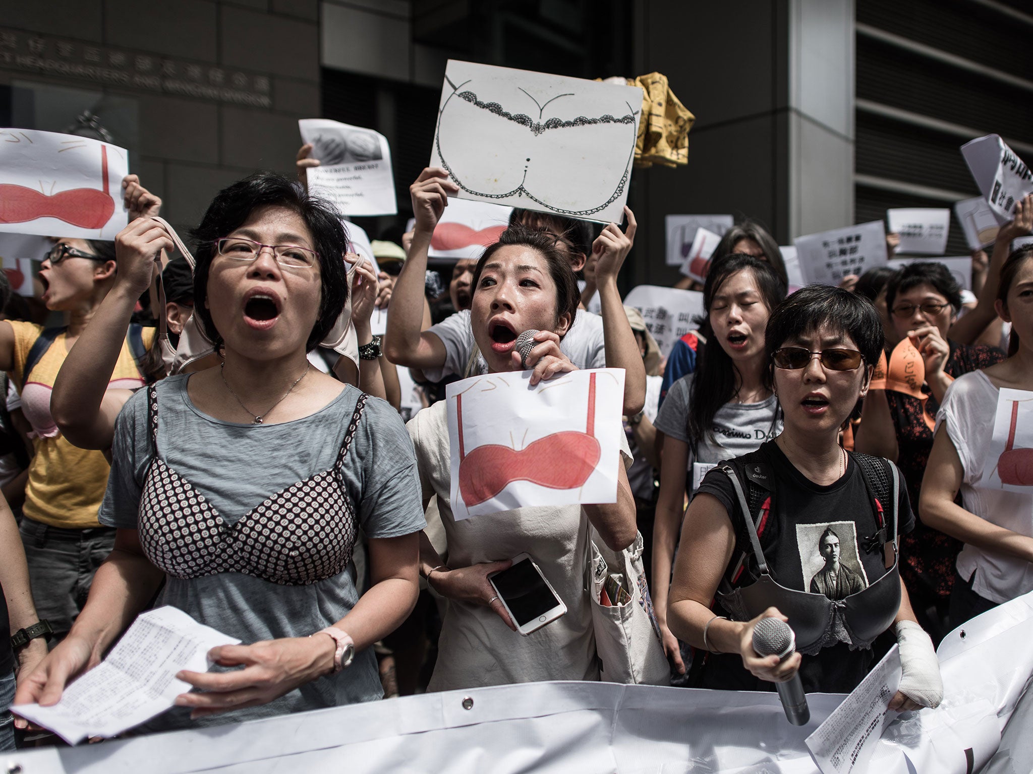 Protesters wore bras and waved banners at the protest in Hong Kong