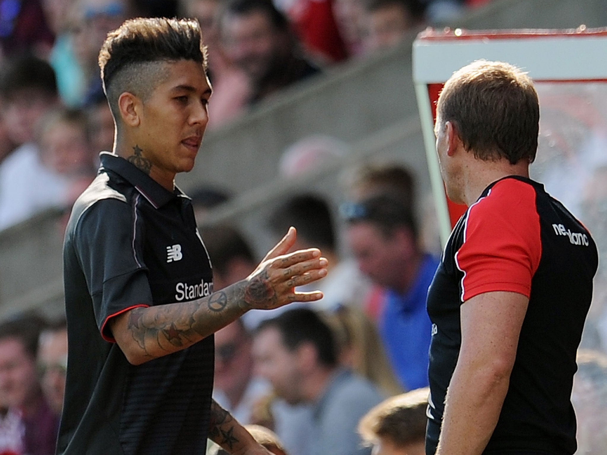 Roberto Firmino with Liverpool manager Brendan Rodgers