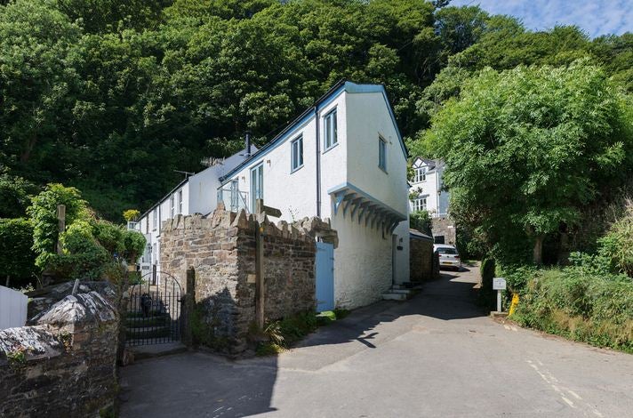 The cottage looks out over a cove (Picture: Blue Chip Holidays)