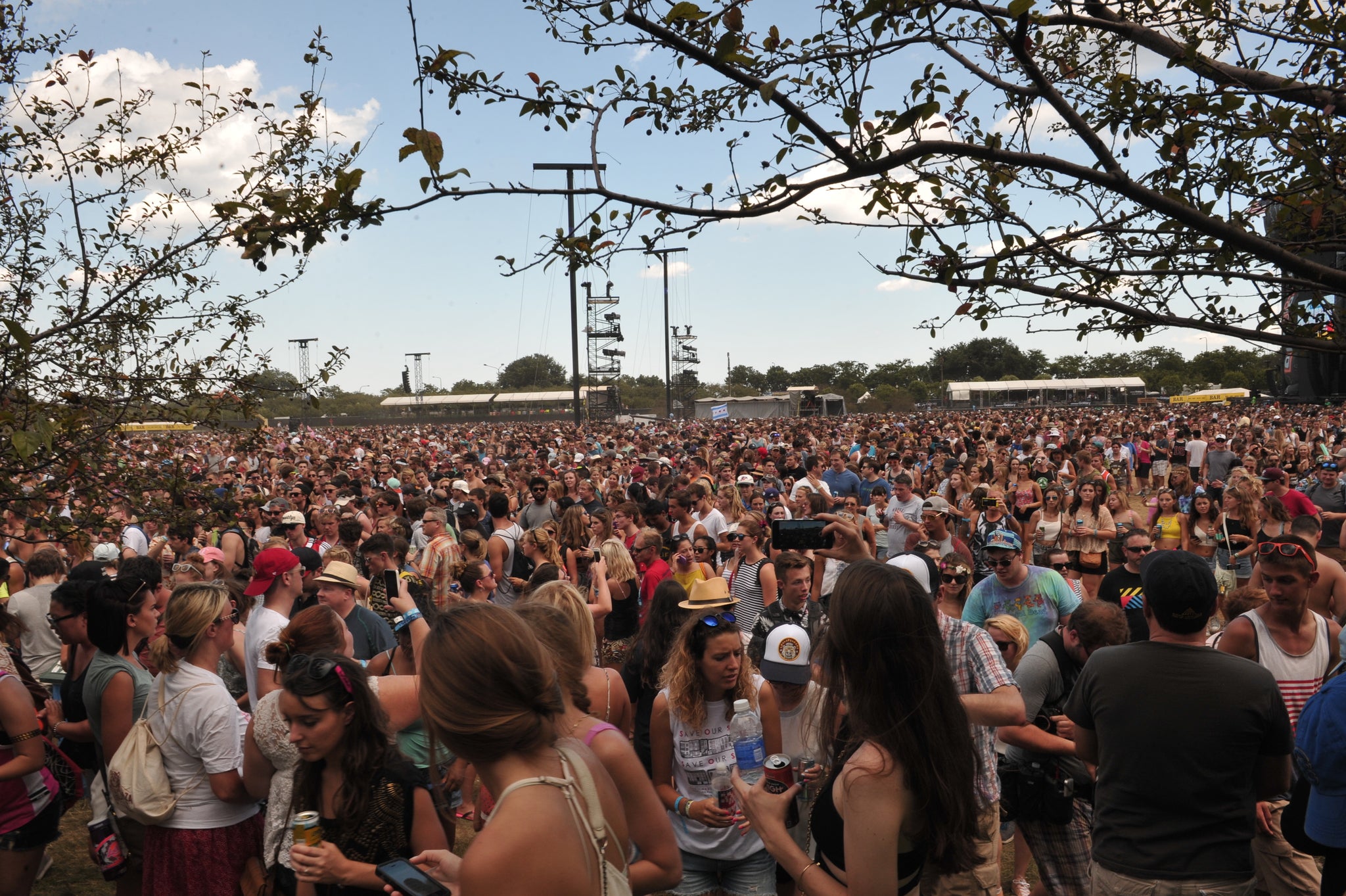 Festival-goers are evacuated from Lollapalooza Music Festival on Sunday 2 August 2015. (Associated Press)