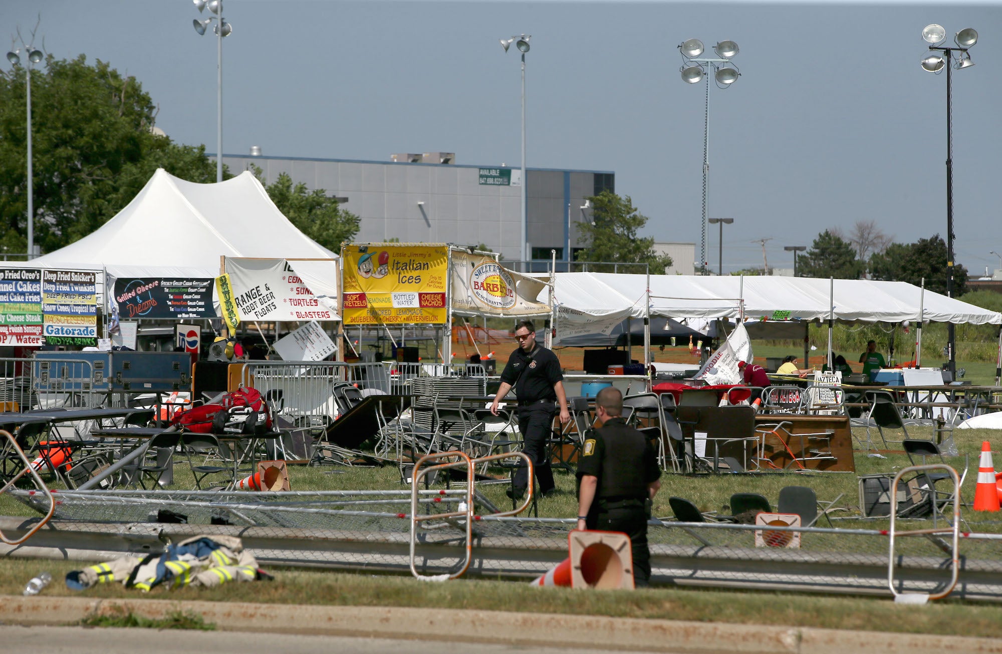 Officials investigate after a fatal tent collapse at the Prairie Fest in Wood Dale, Illinois. (Stacey Wescott/Chicago Tribune/Associated Press)