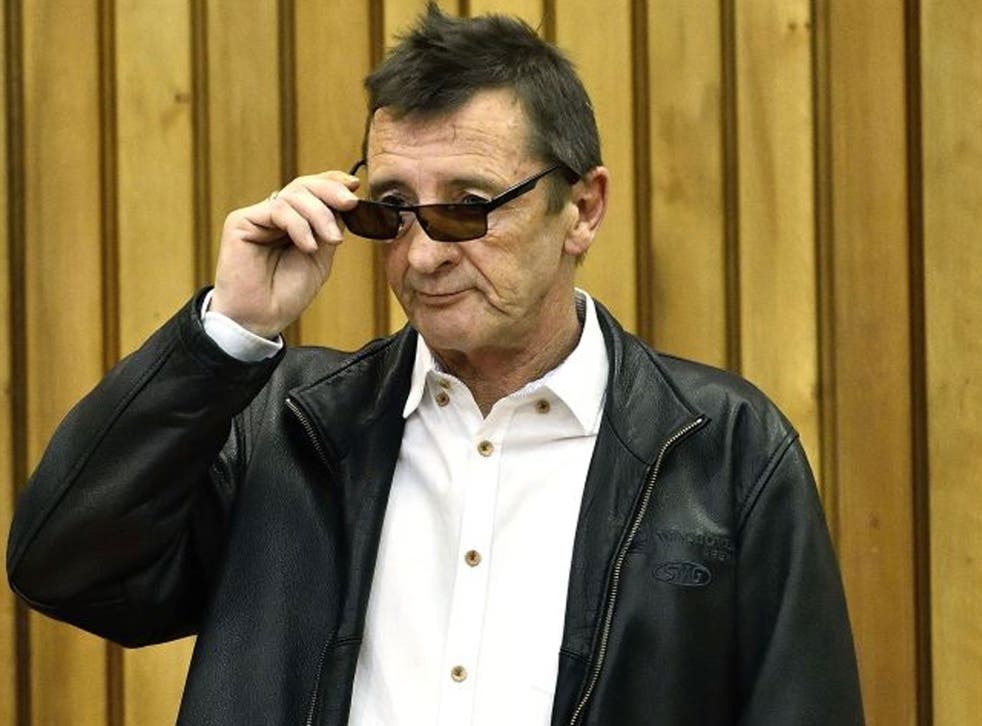 Former AC/DC drummer Phil Rudd stands in the dock at the District Court