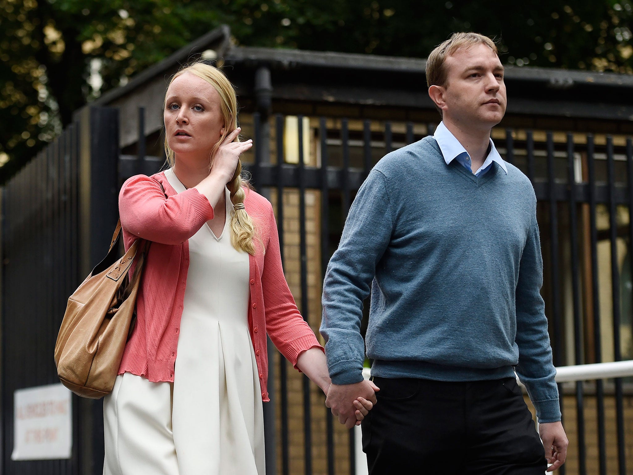 Tom Hayes arrives with his wife, Sarah, at Southwark Crown Court in London