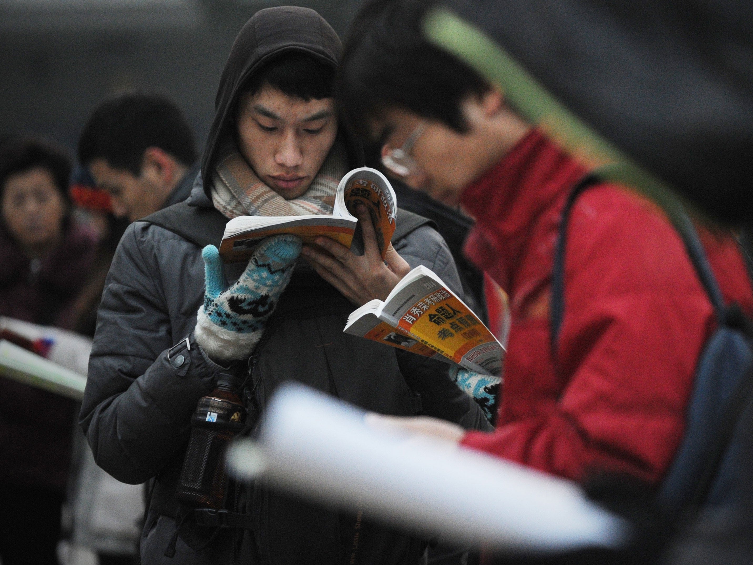Students do last-minute revision before a university exam in Beijin
