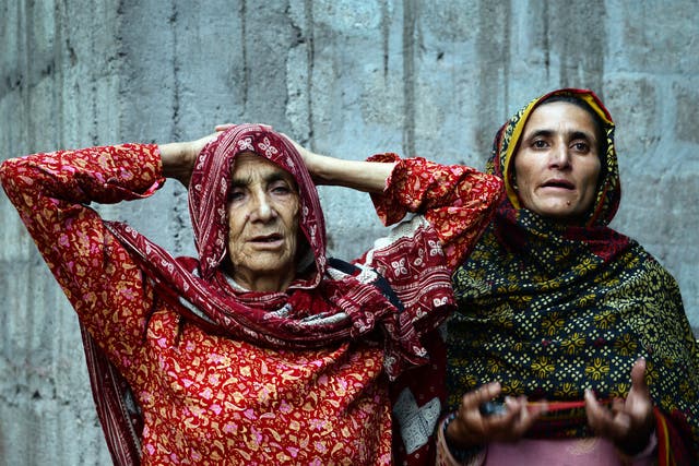Shafqat Hussain’s mother, Makhni Begum (left) and his sister Sumaira Bibi after his execution in Muzaffarabad, Pakistan
