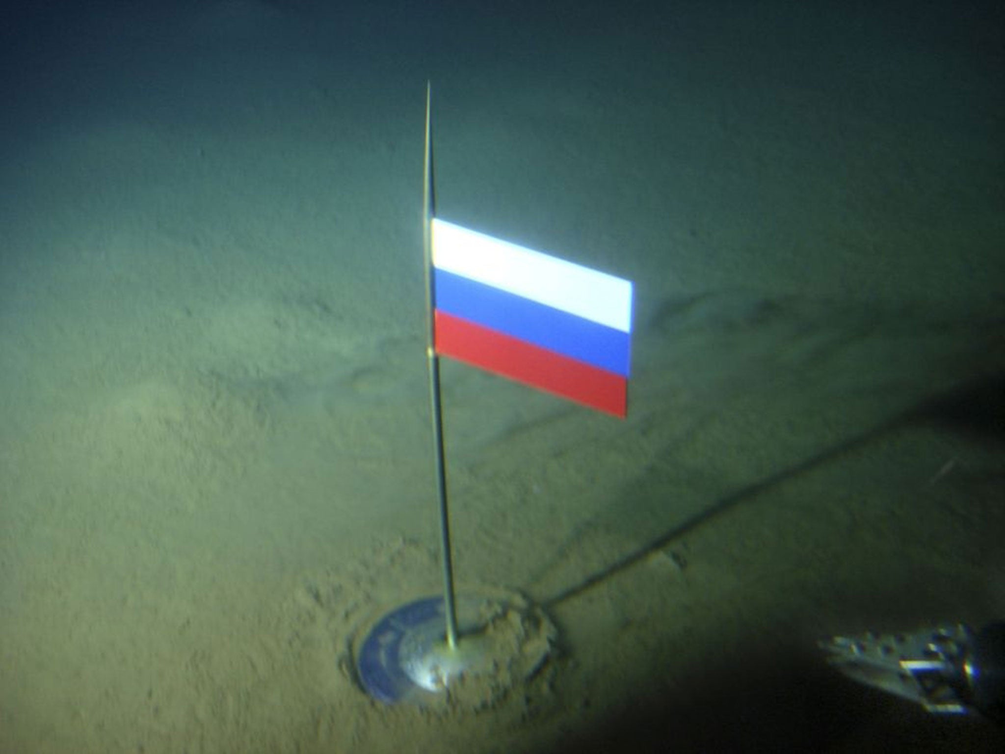 The Russian flag planted in the Arctic Ocean