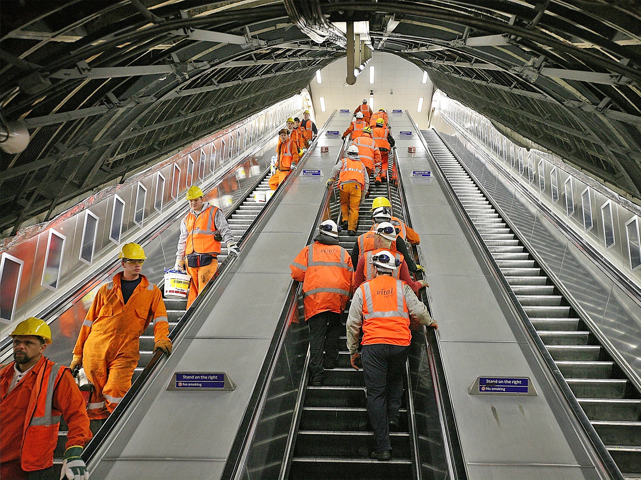 Maintenance workers arrive for their night shift at Victoria Underground station in London