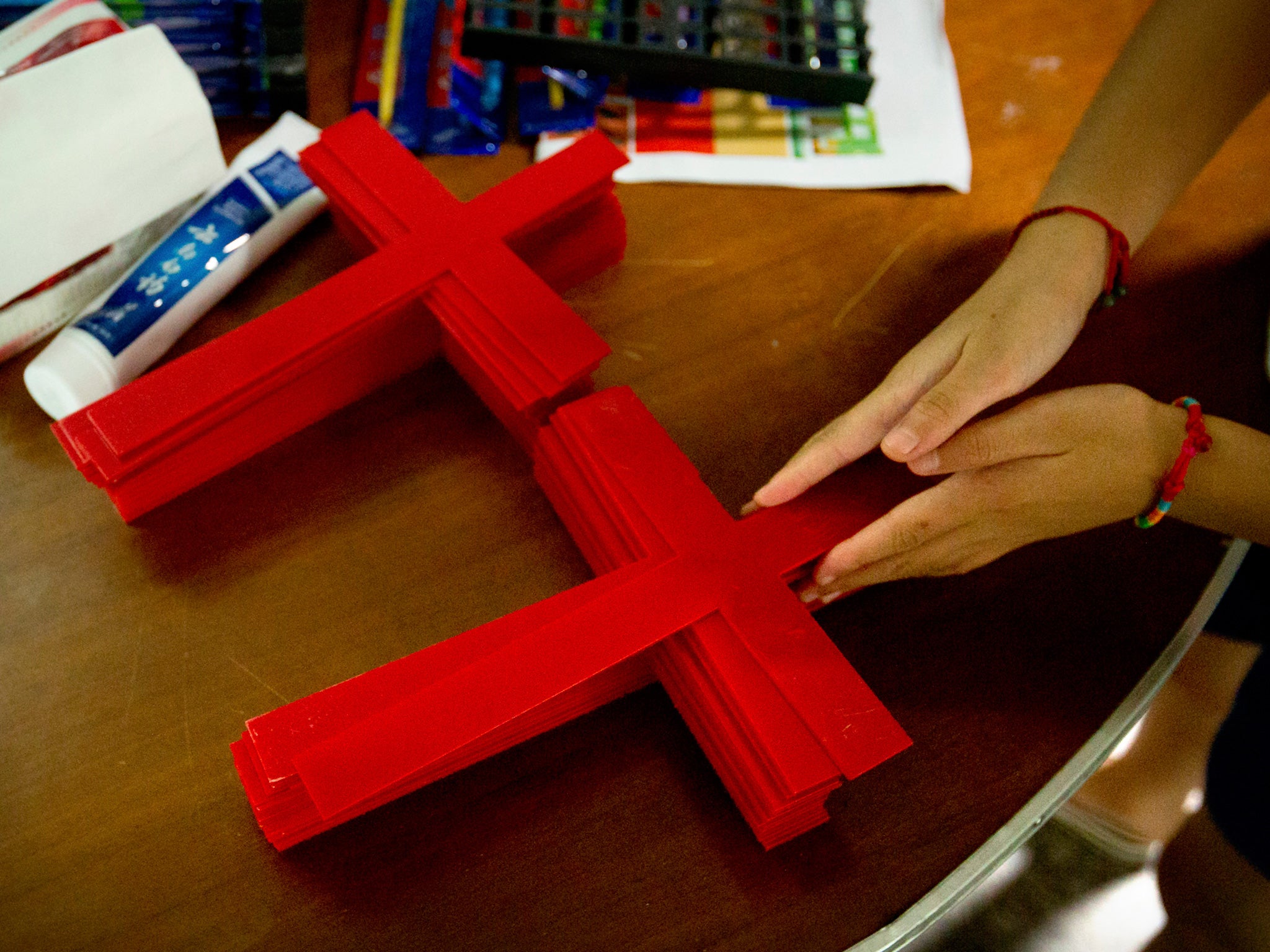 Many churches have re-erected crosses in defiance