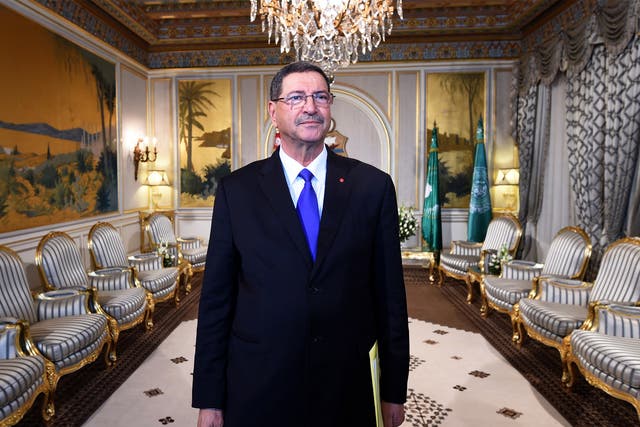 Tunisian Prime Minister Habib Essid says the authorities are working closely with Britain to trace terror networks