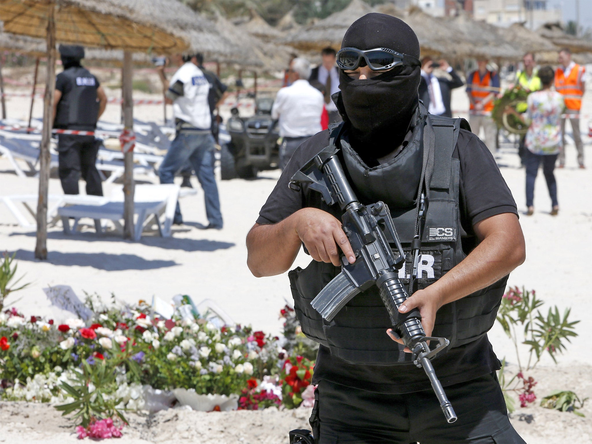 A Tunisian police officer at the scene of June's attack in Sousse