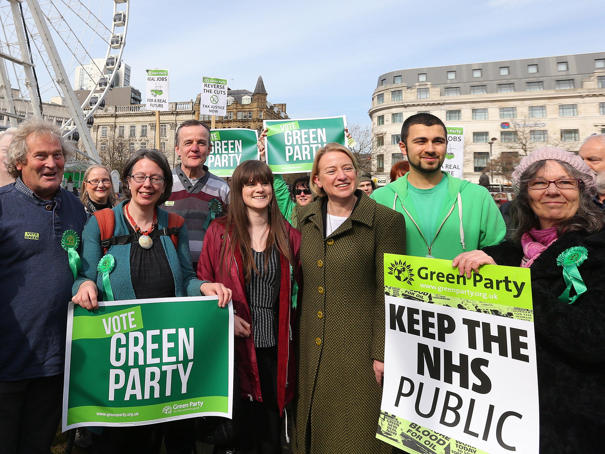 Green Party members and supporters - including its leader, Natalie Bennett - on the campaign trail in Manchester earlier this year (Getty)