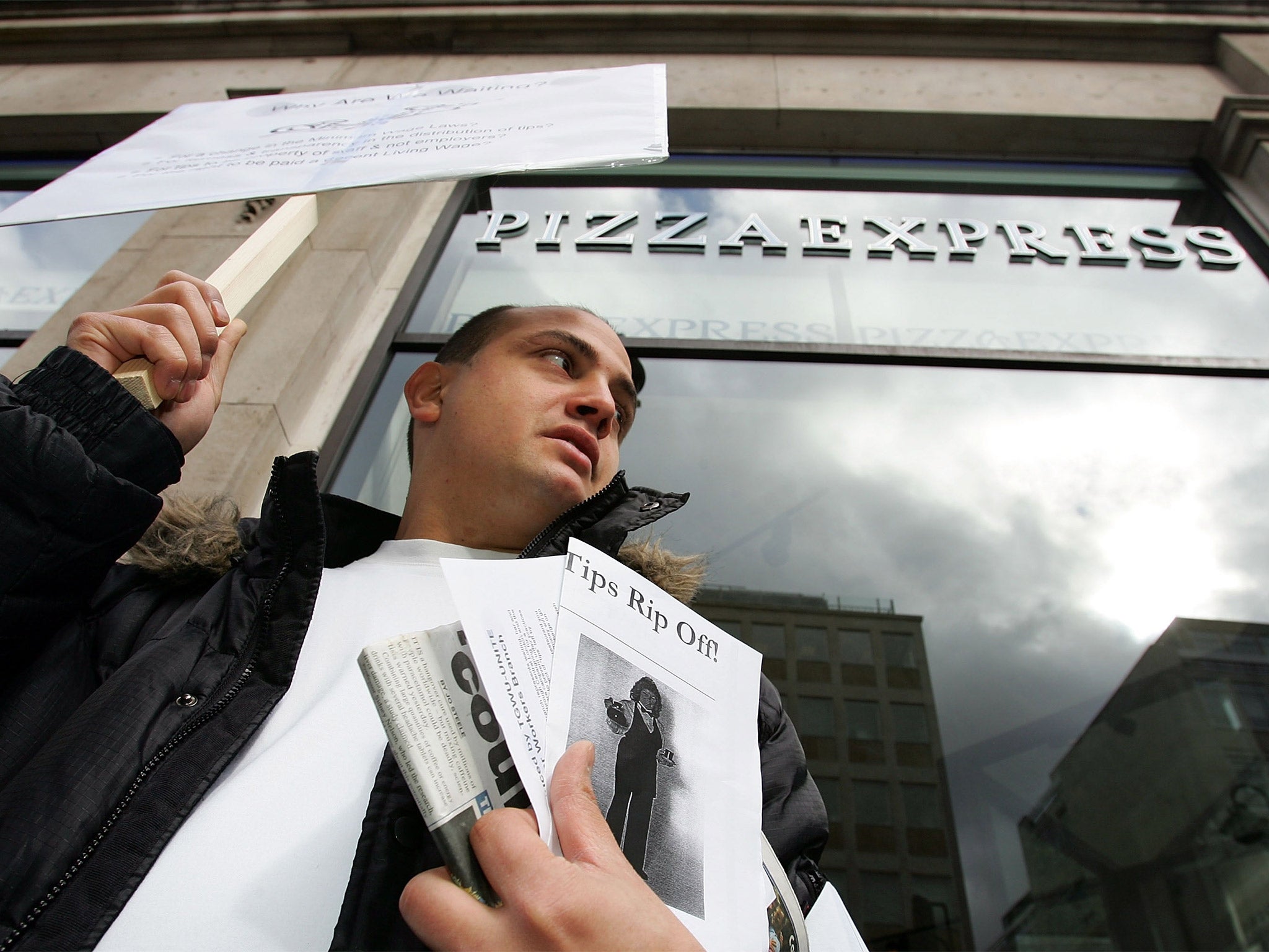 A protest outside Pizza Express in 2007 over the handling of staff tips