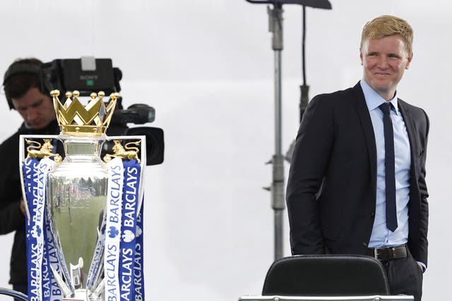 Bournemouth manager Eddie Howe sneaks a glance at the Premier League trophy