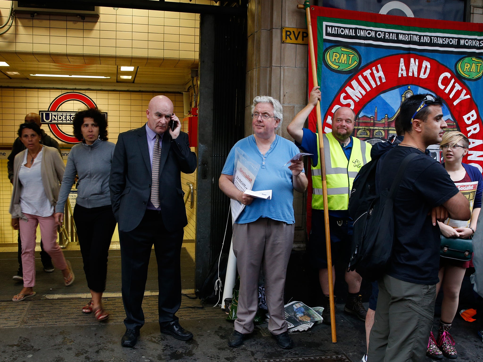 RMT union members gather outside Paddington Station as the union starts a 24 hour strike on the London Underground