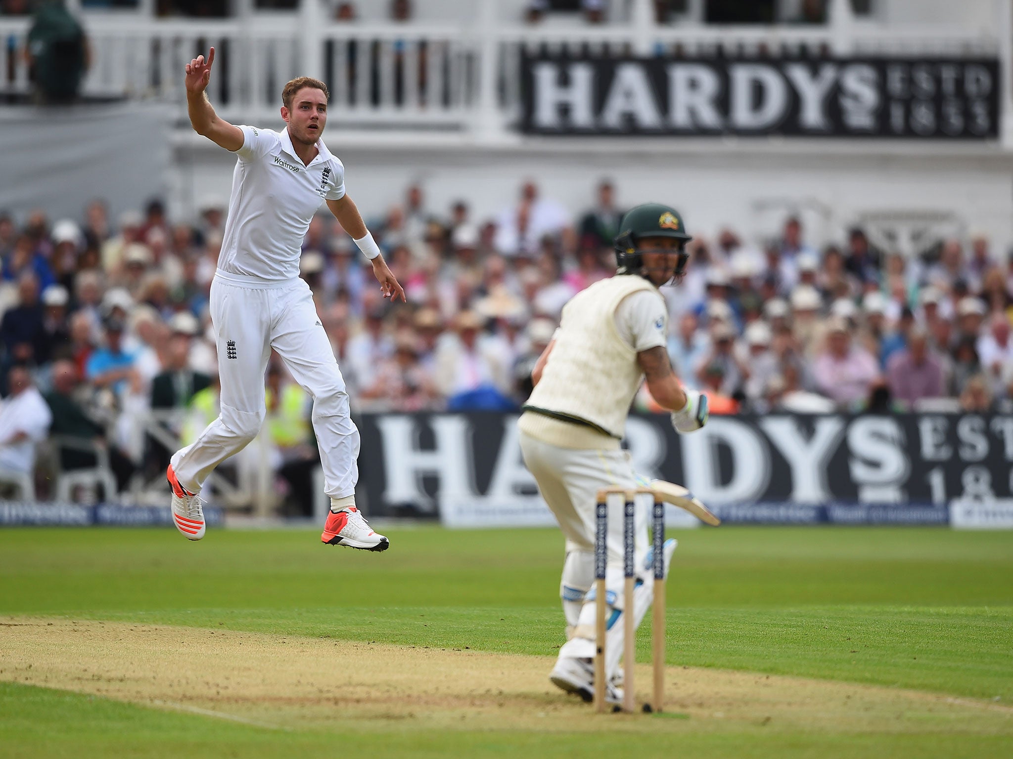 Stuart Broad of England celebrates taking his fifth wicket, that of Michael Clarke