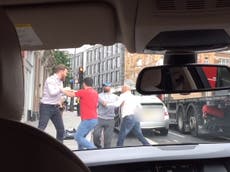 Two 'Uber drivers' and passenger fight over clipped wing mirror in London