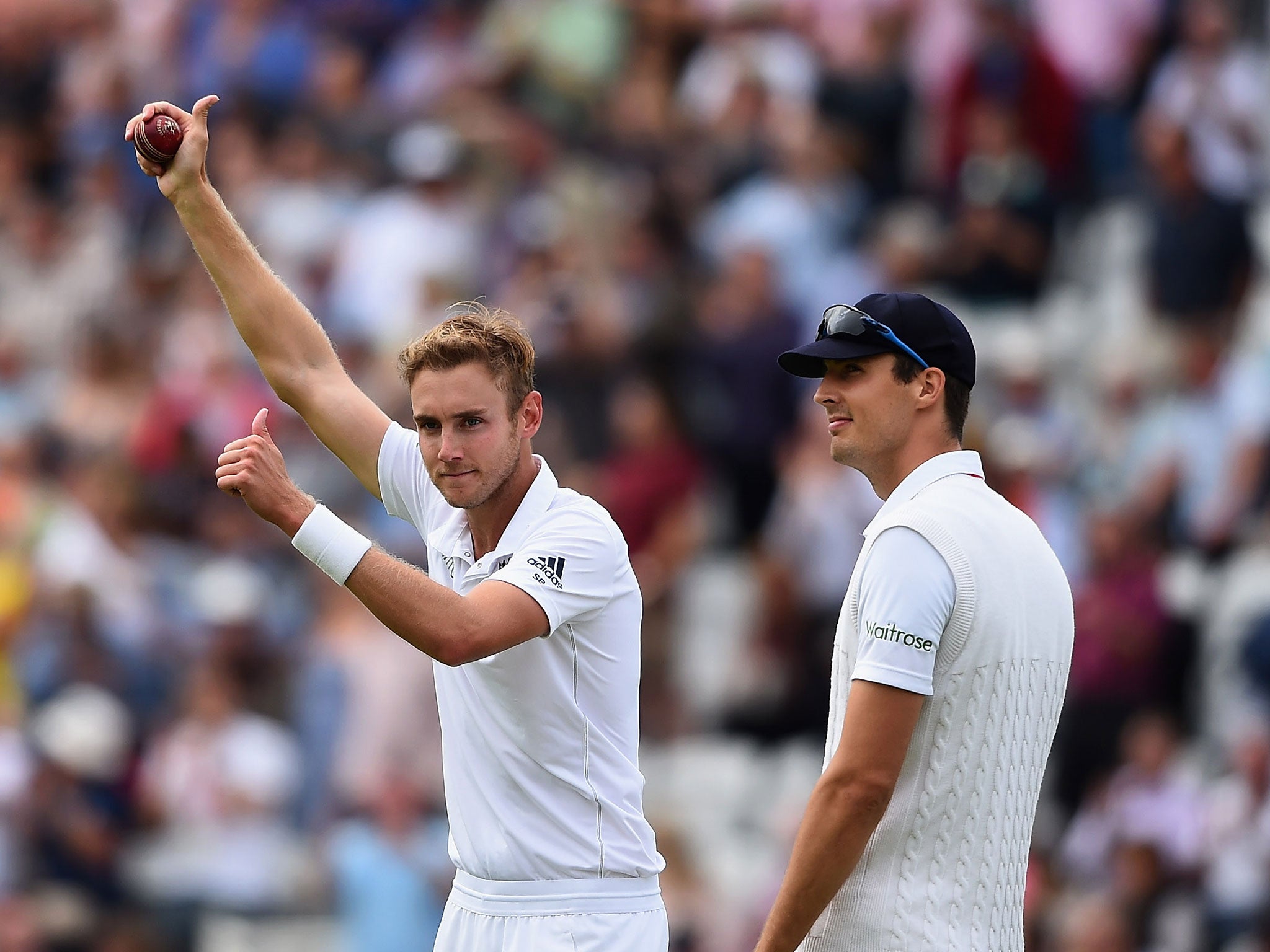 Stuart Broad of England celebrates taking his fifth wicket, that of Michael Clarke