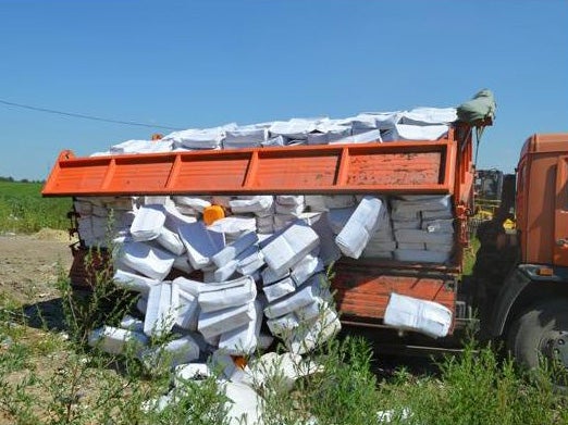 Ten tonnes of imported cheese flattened and dumped in Russia as part of 'destruction' of banned Western food