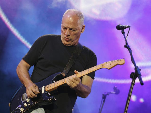 David Gilmour playing on stage with Pink Floyd in 2005