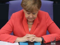 Greece debt crisis: German Chancellor Angela Merkel suffers biggest revolt yet, but bailout passes