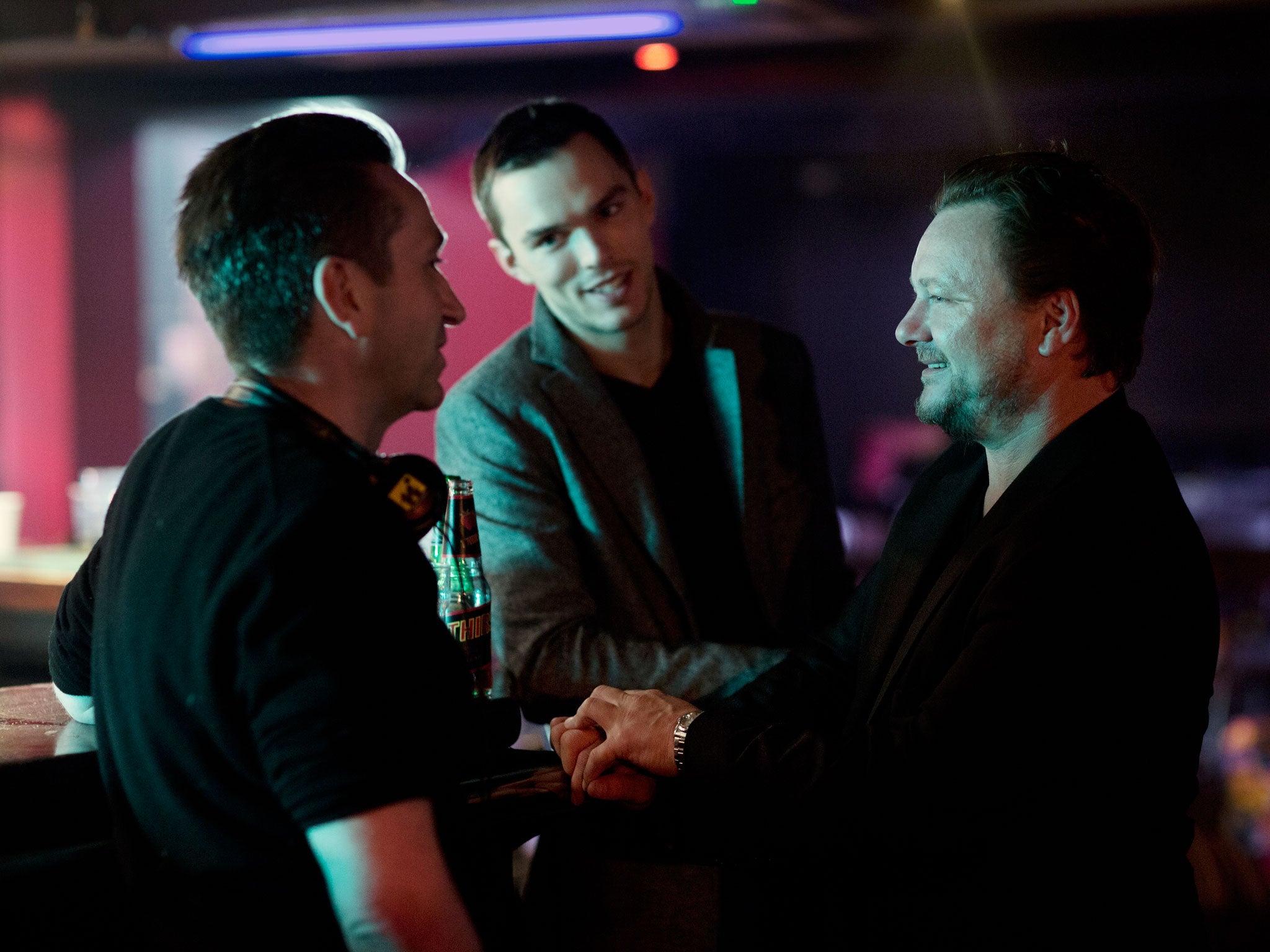 Producer Gregor Cameron, actor Nicholas Hoult and John Niven on the set of 'Kill Your Friends'