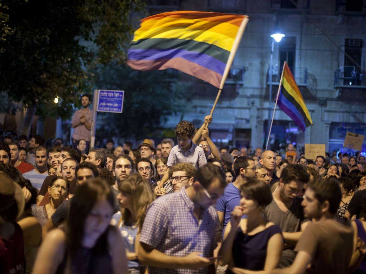 Israelis and members of the gay community attend an anti-homophobia rally following an attack on the Gay Pride Parade in July