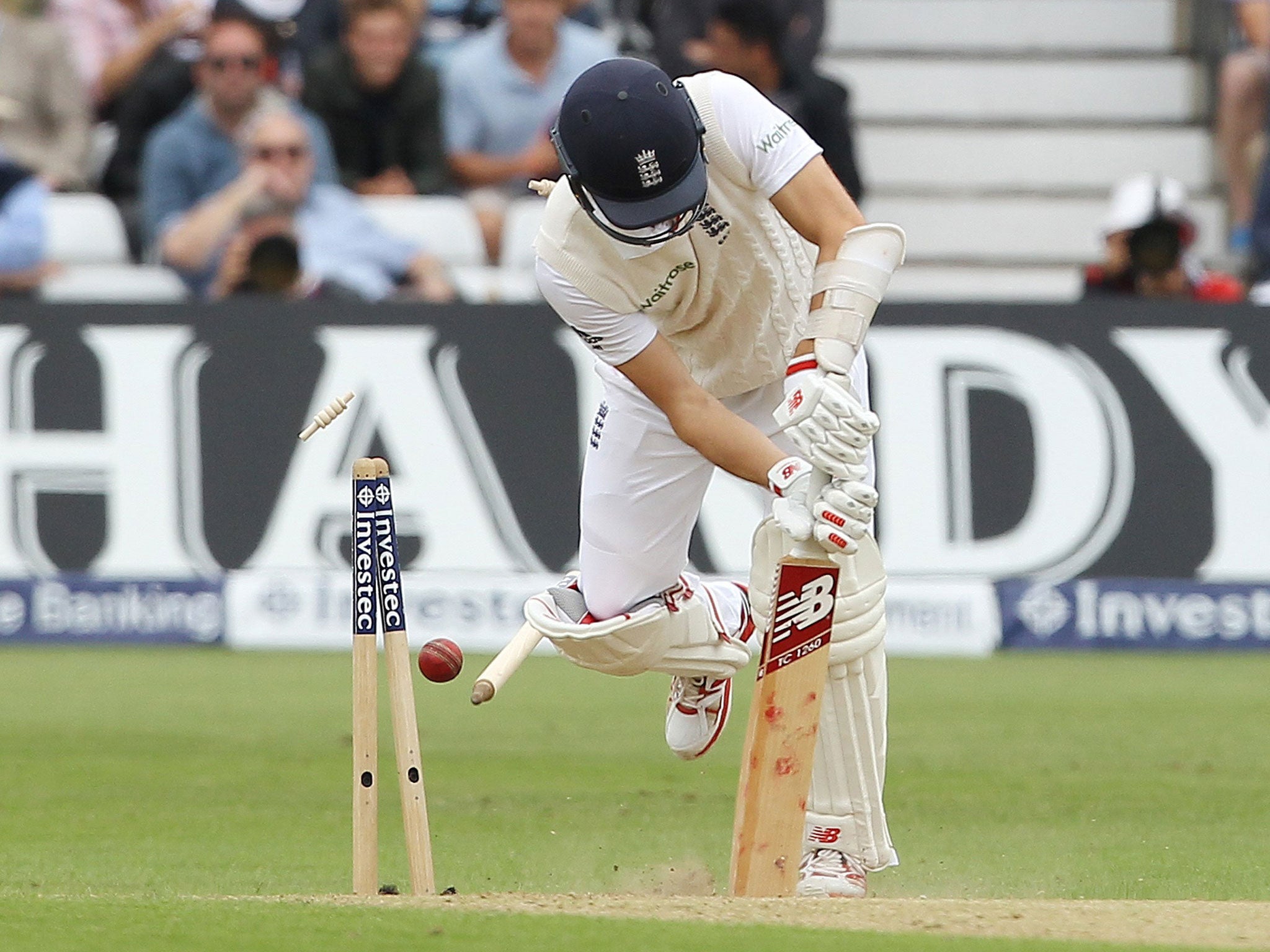 England's Mark Wood loses his wicket bowled out by Australia's Mitchell Starc