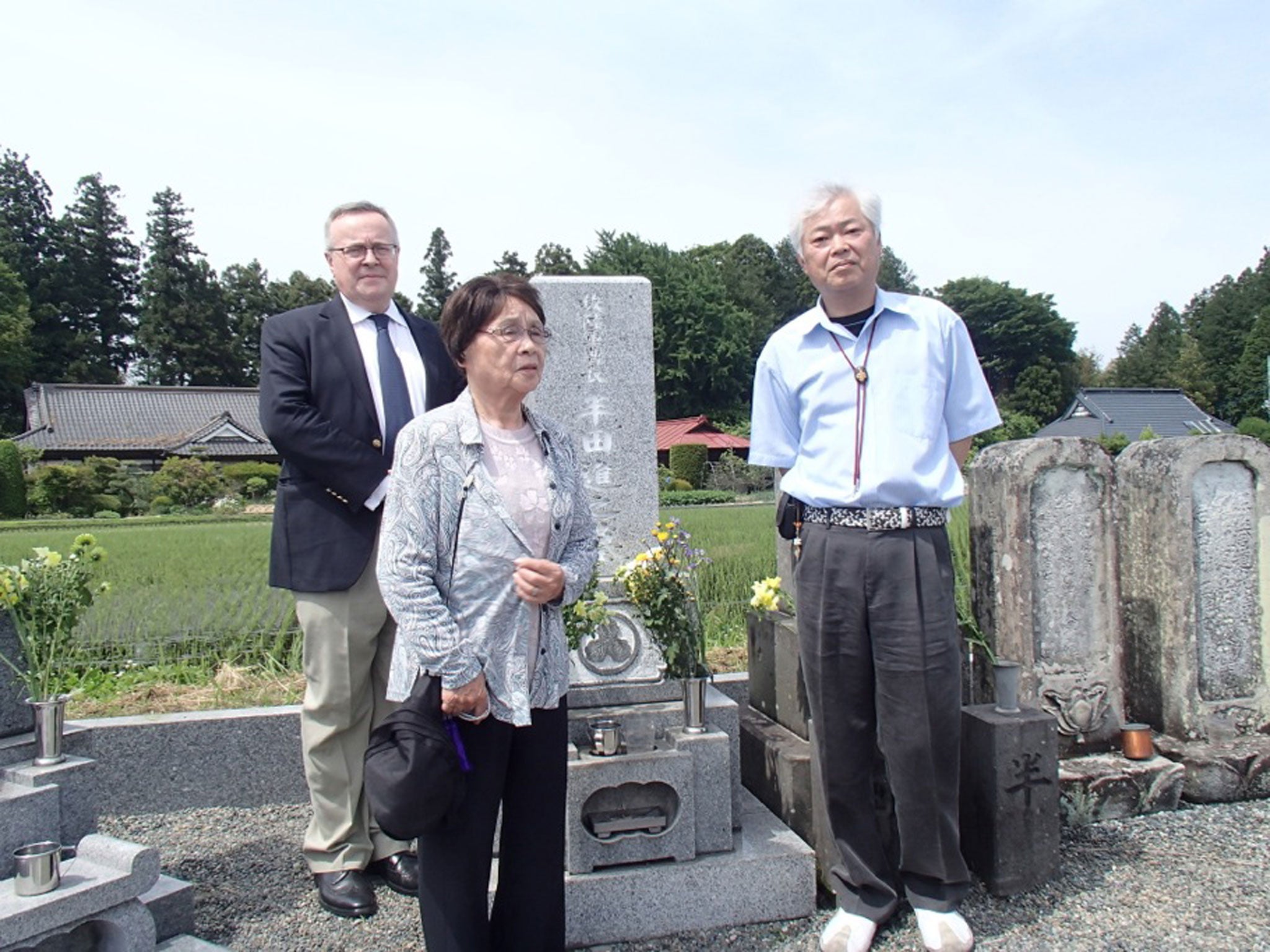 Andrew Marshall, Kimura and Norio Handa at the family memorial plot