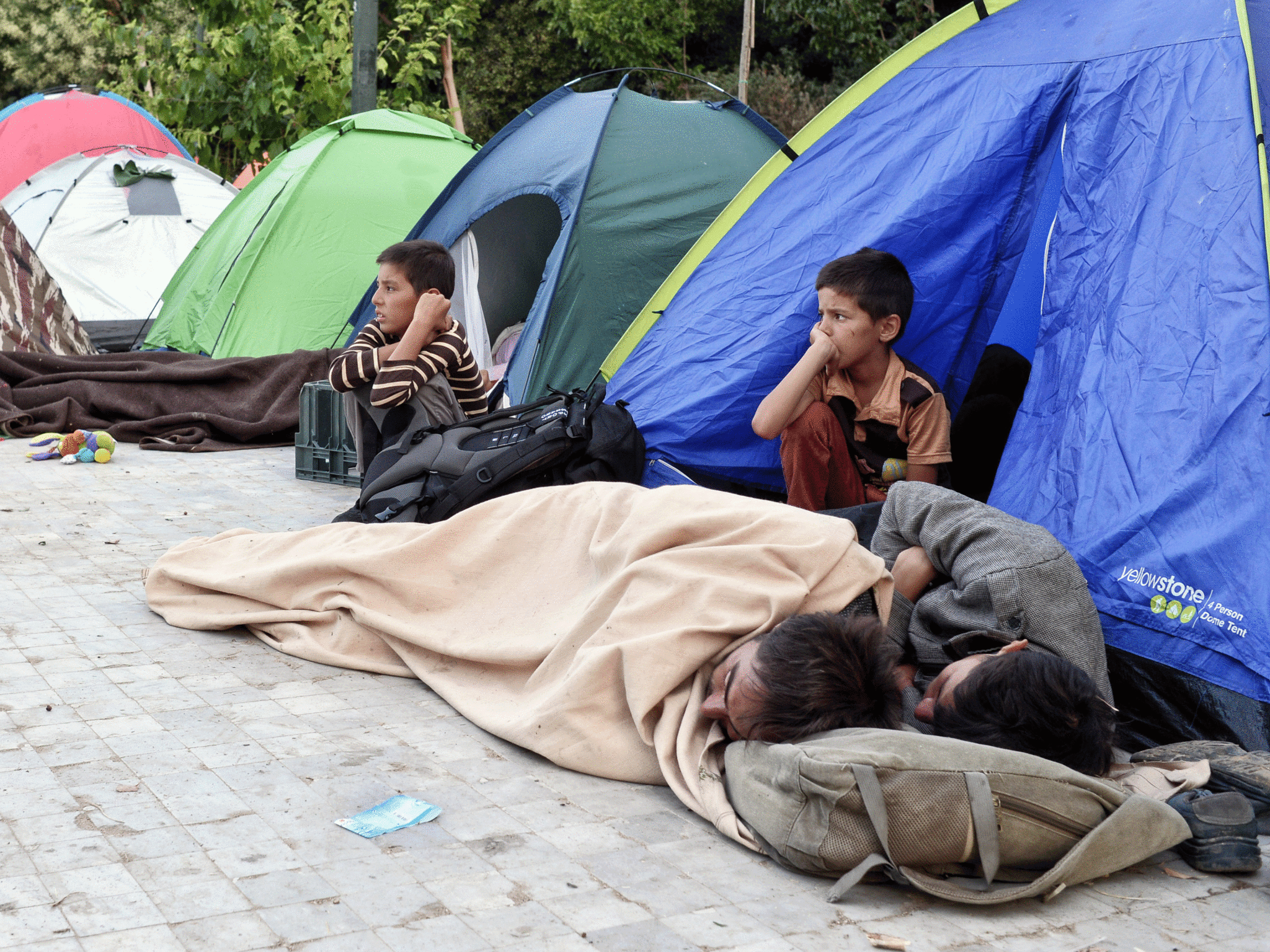 Migrants camp out in Athens