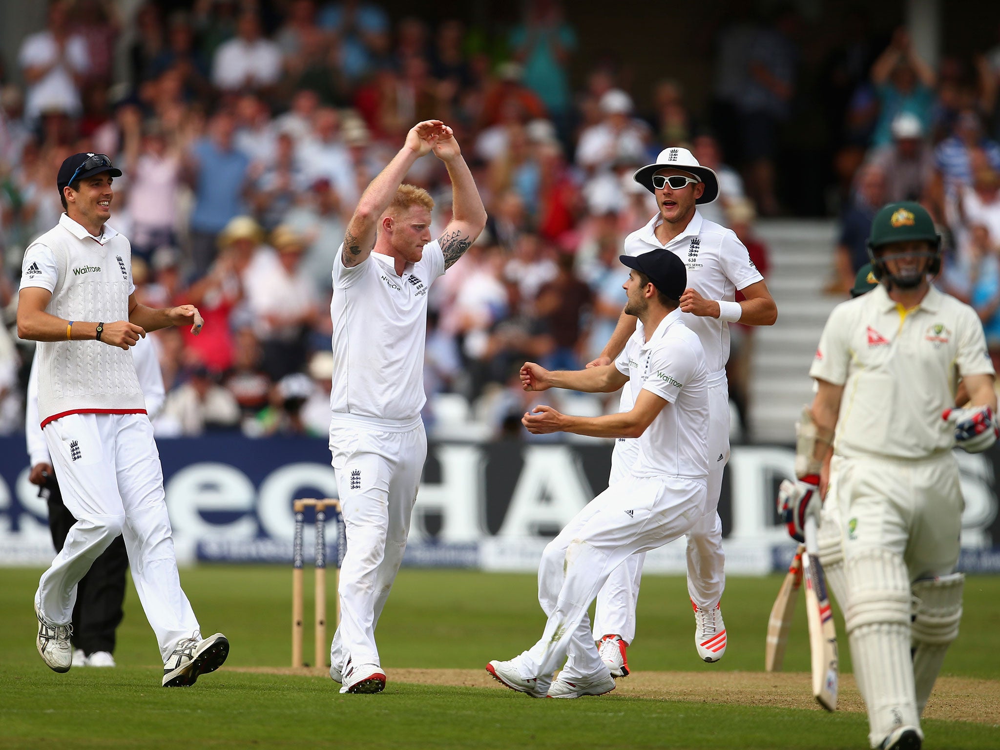 Ben Stokes of England celebrates after taking the wicket of Chris Rogers