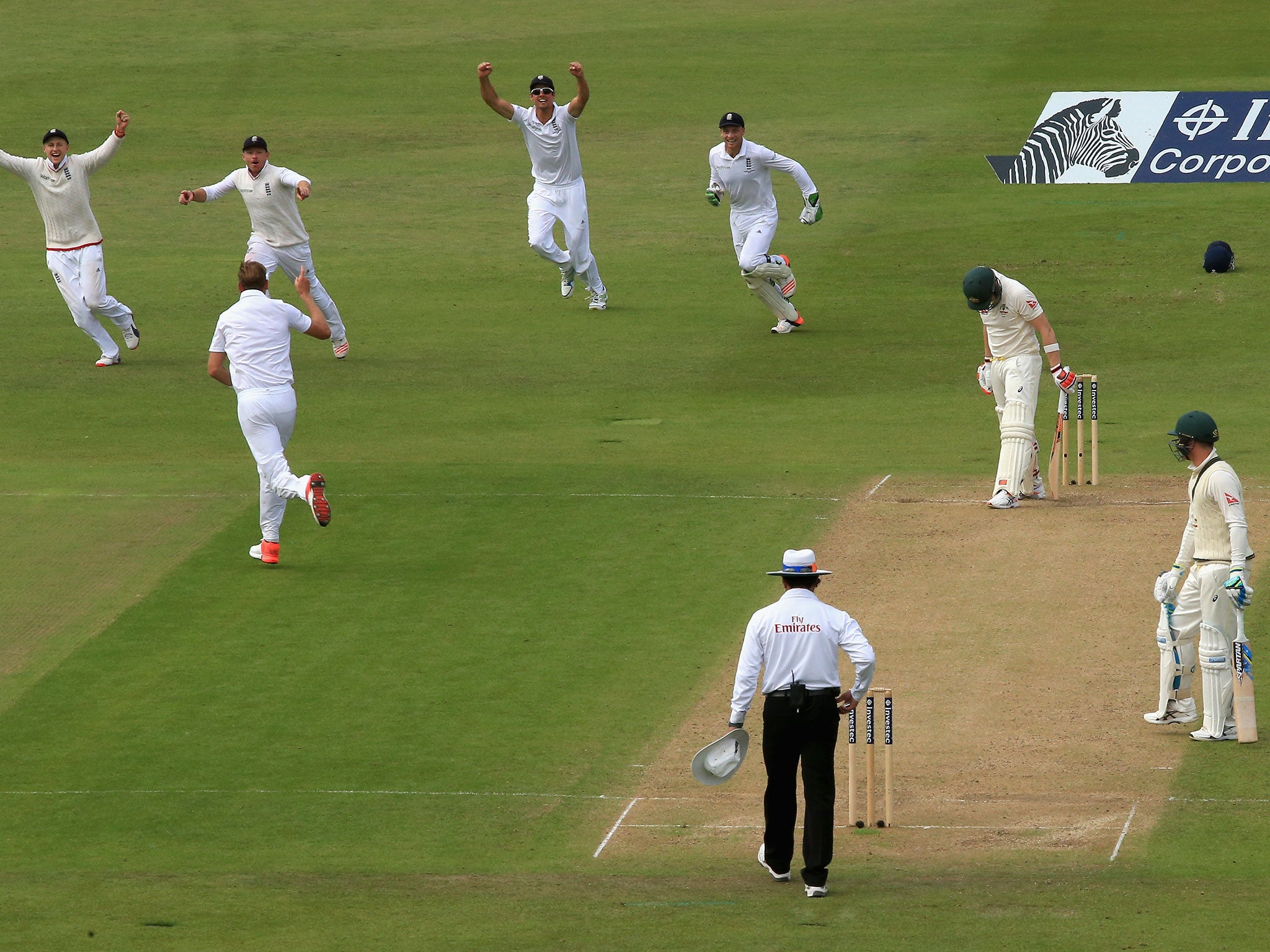 Steve Smith of Australia looks dejected after being dismissed by Stuart Broad