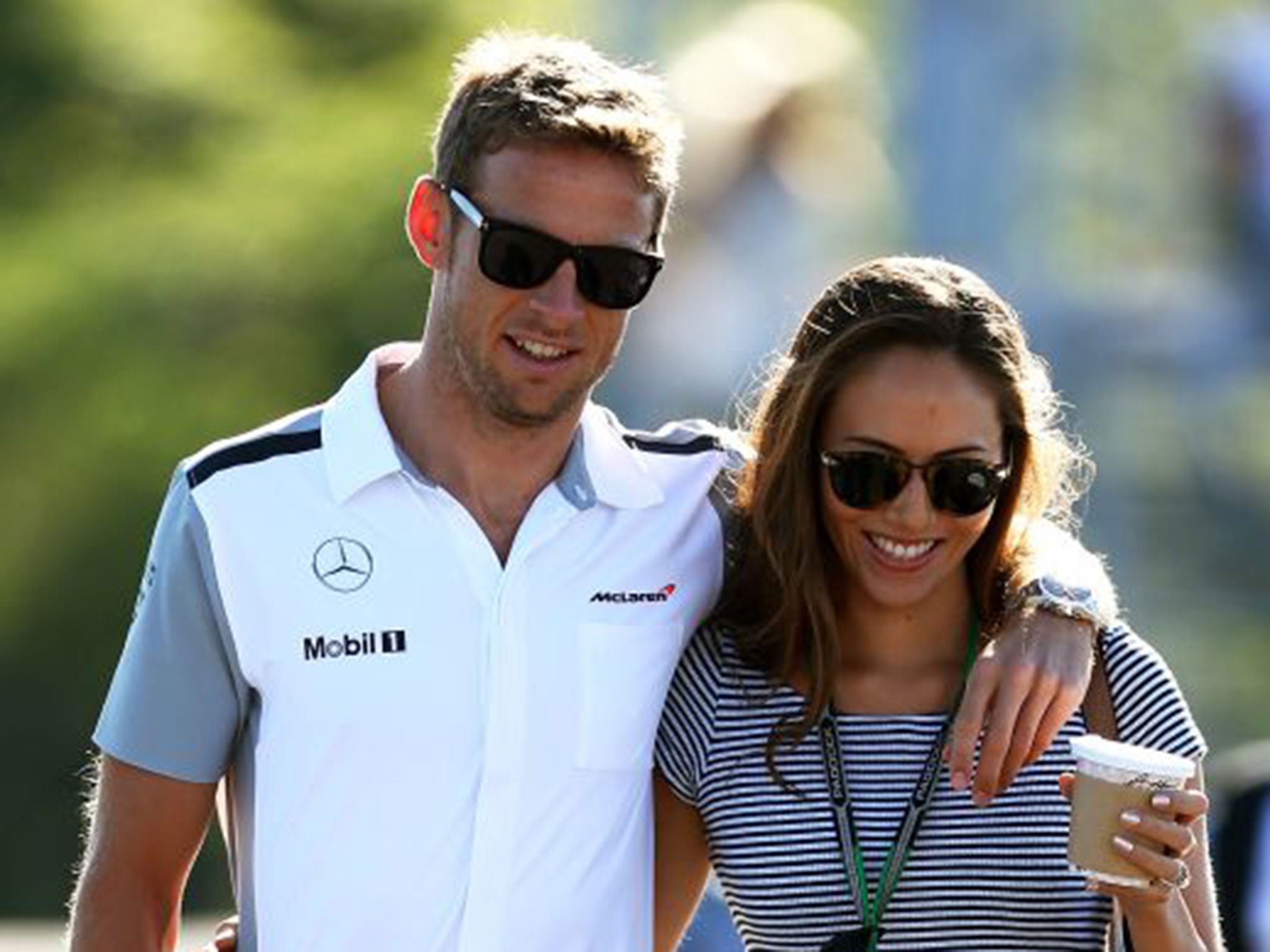 Jenson Button and girlfriend Jessica Michibata arrive at the final practice ahead of the Canadian Formula One Grand Prix