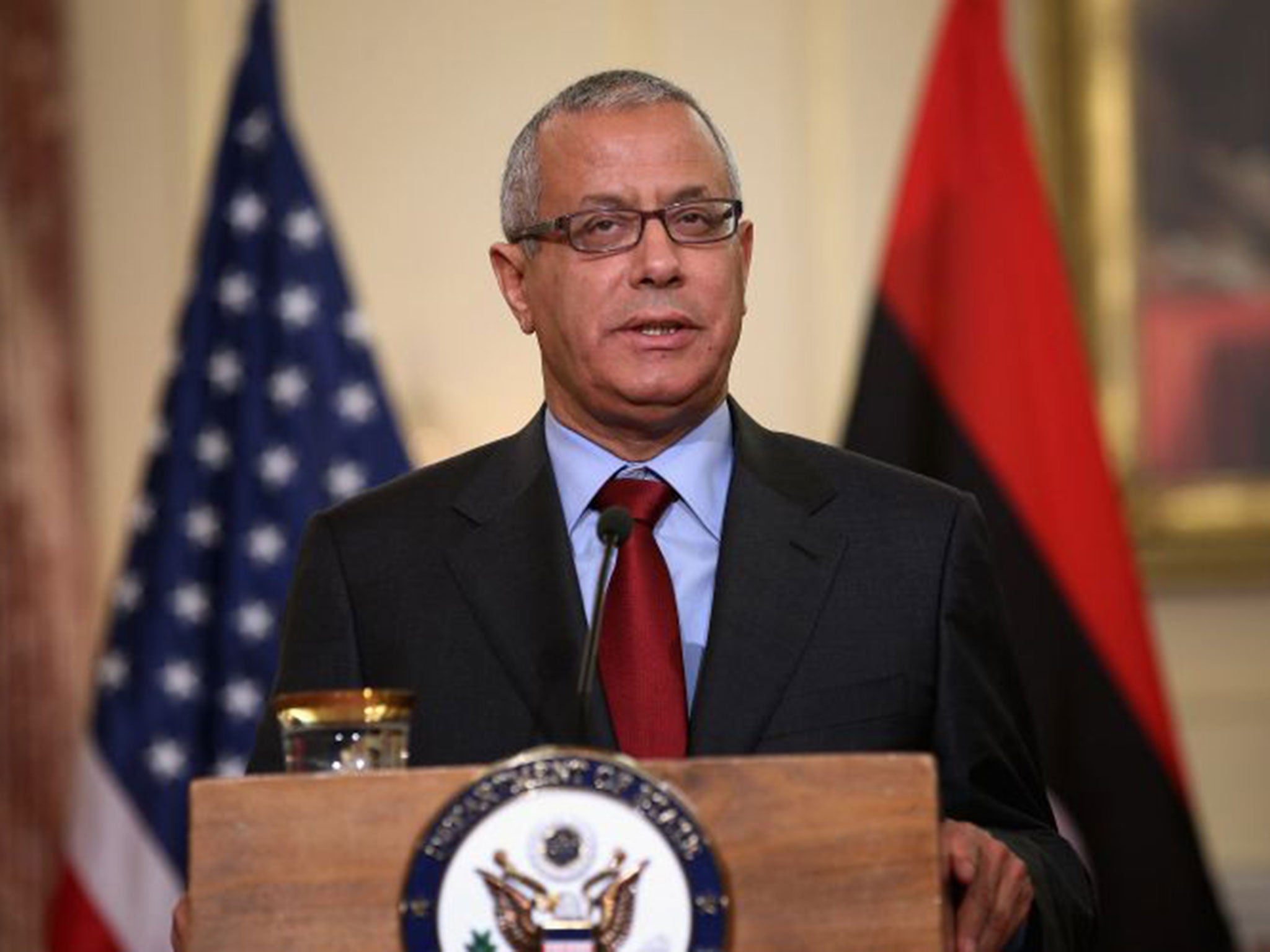 Libyan Prime Minister Ali Zeidan speaks during a news conference with U.S. Secretary of State John Kerry