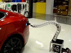 Tesla unveils its 'Snakebot' automatic car charger