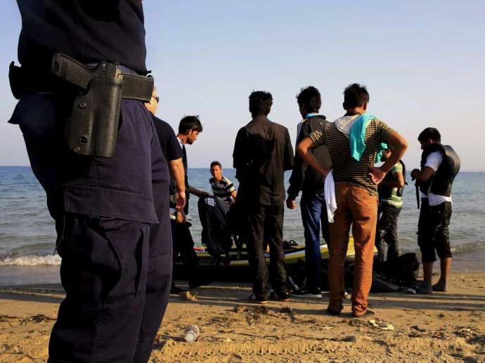Migrants arrive on the Italian coast