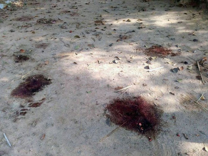 Blood stains on the ground where the women were beaten to death in Kanjia village