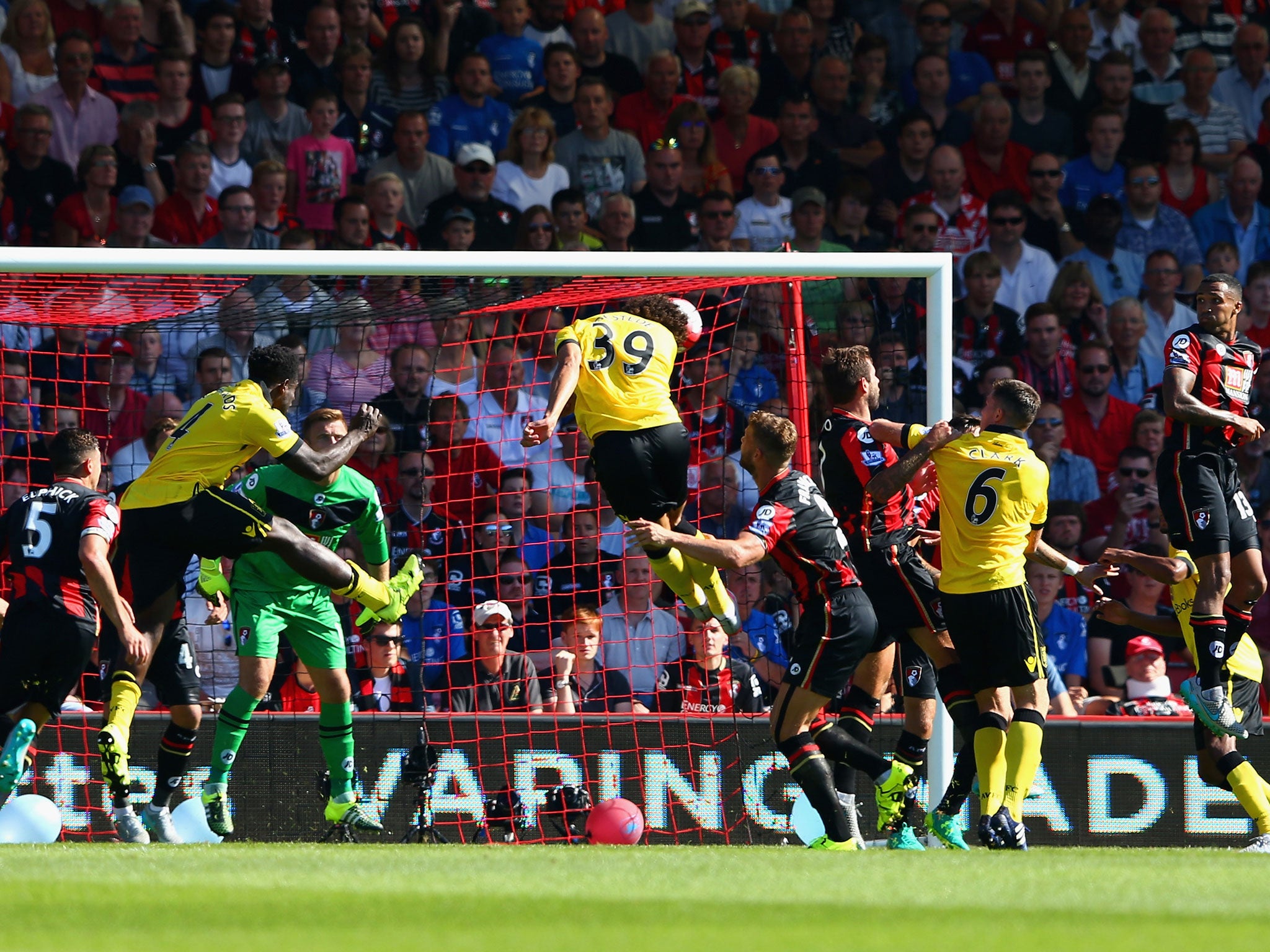 Rudy Gestede (C) of Aston Villa scores his team's first goal