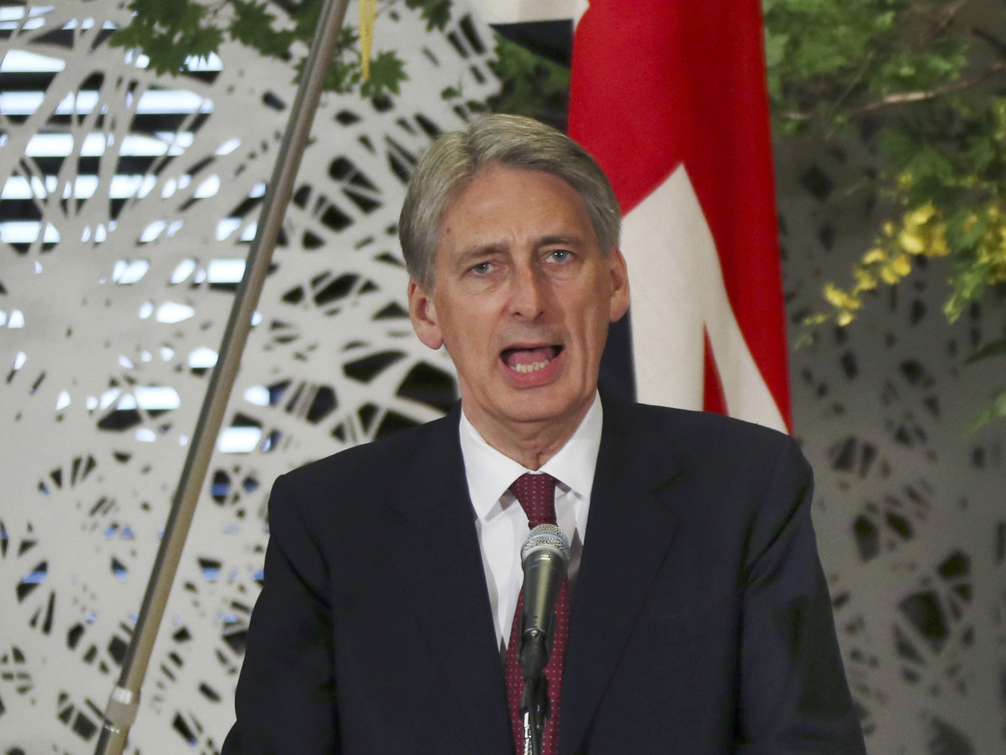 British Foreign Secretary Philip Hammond speaks in Tokyo, Saturday, Aug. 8, 2015