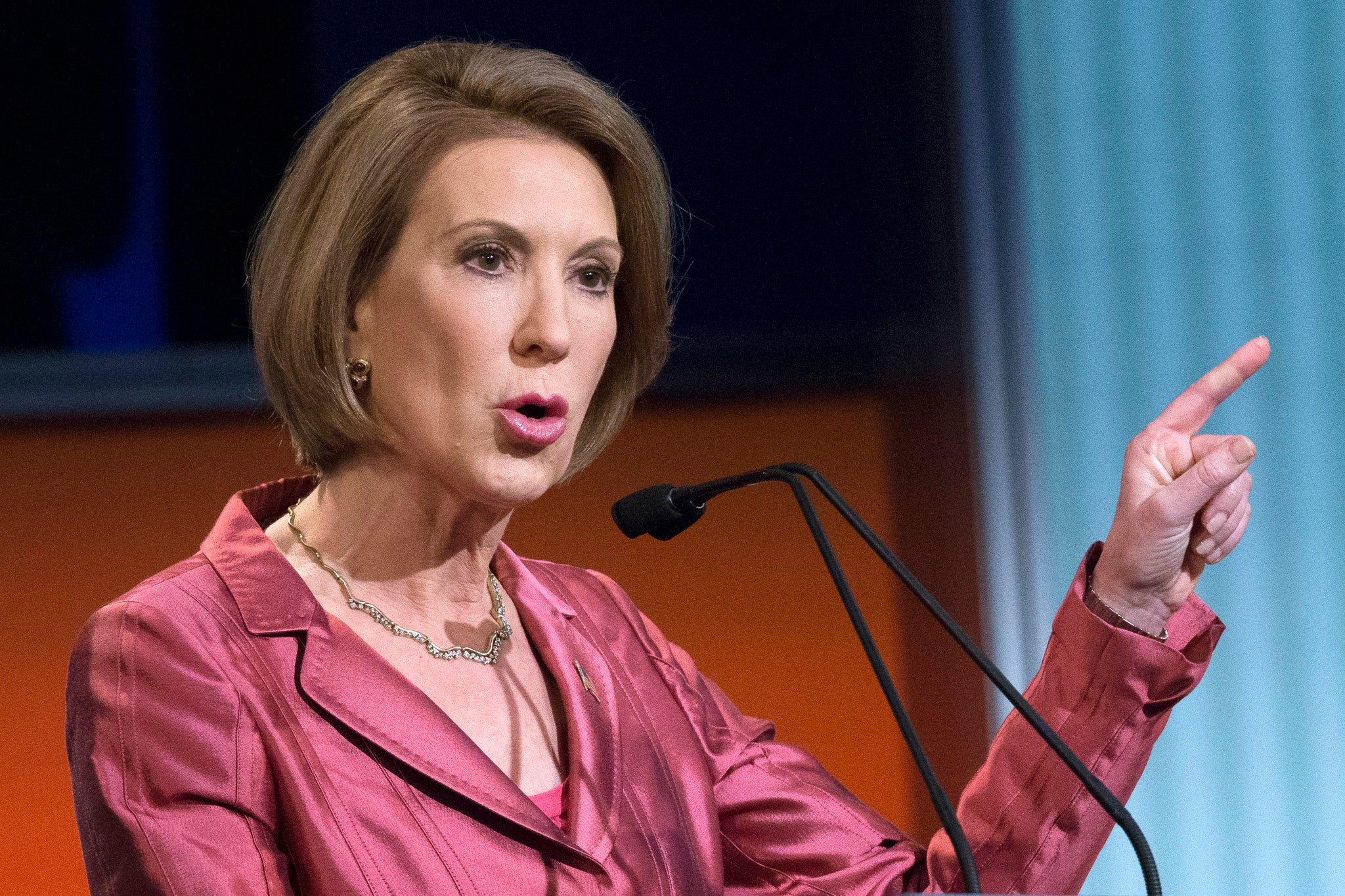 Republican presidential candidate Carly Fiorina speaks during a pre-debate forum at the Quicken Loans Arena, Thursday, Aug. 6, 2015, in Cleveland. Seven of the candidates have not qualified for the primetime debate. (AP Photo/John Minchillo)