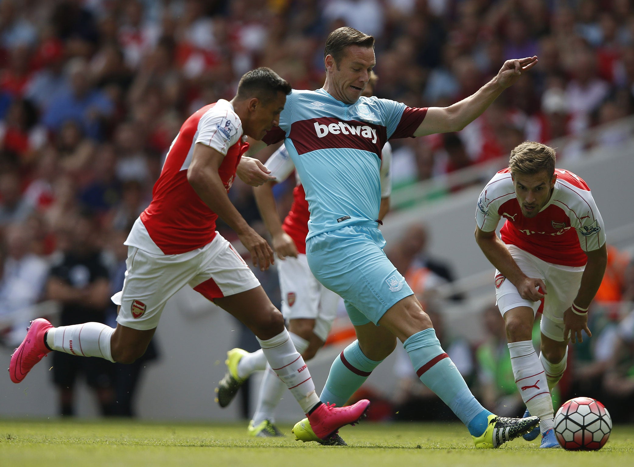 Alexis Sanchez (left) in action for Arsenal last weekend