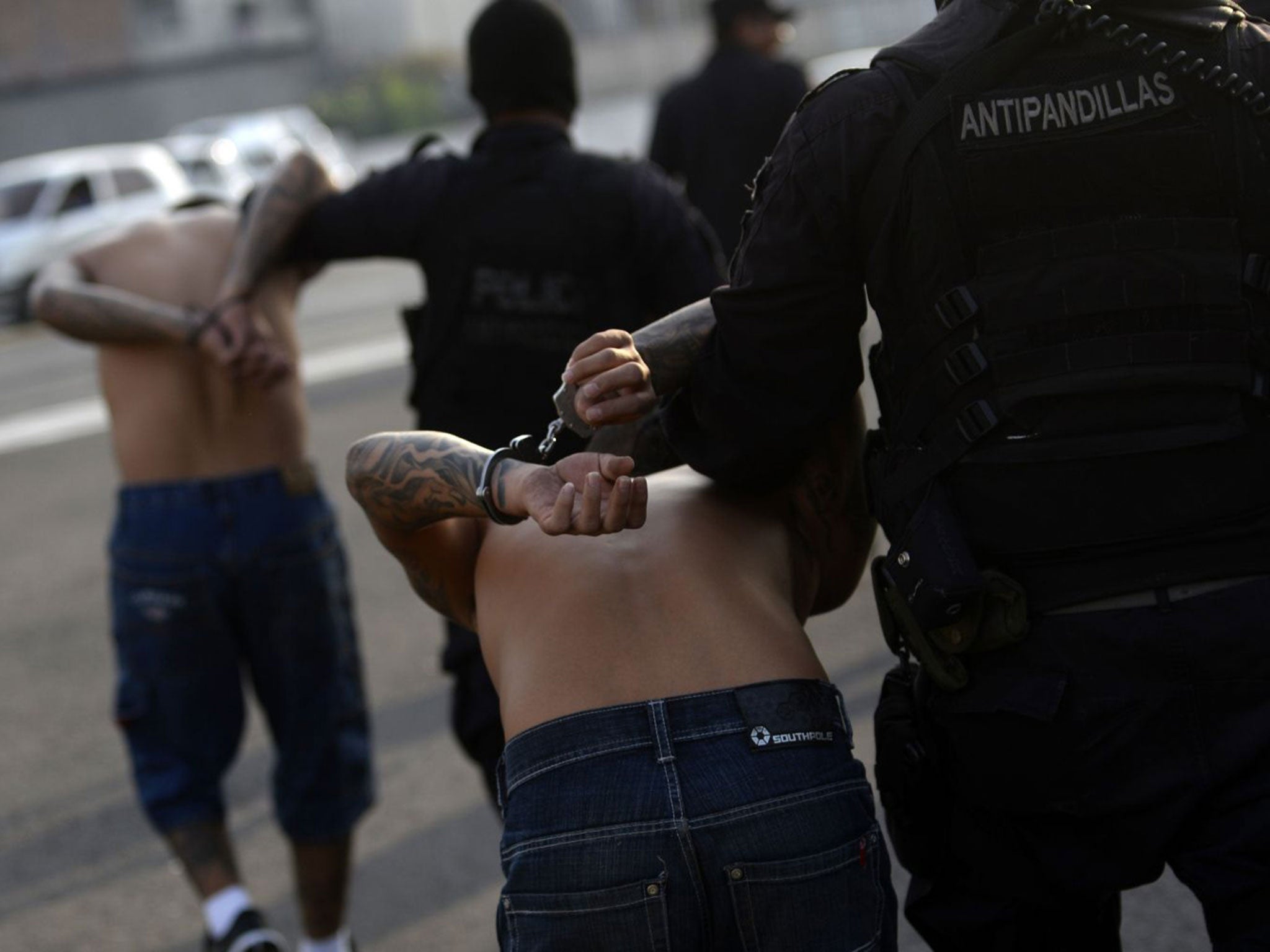 Alleged members of the 18th Street gang are detained by members of the Salvadoran Army during an operation in search of gang members in San Salvador