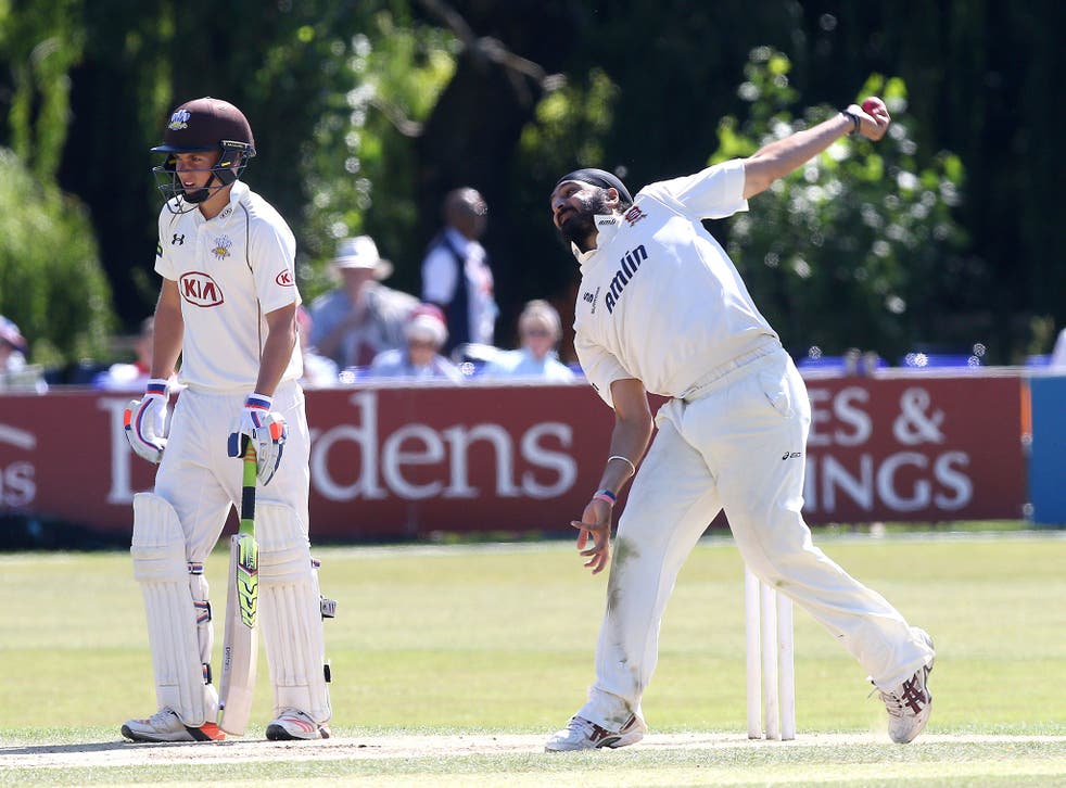 Monty Panesar, right, took four wickets in his comeback match for Essex