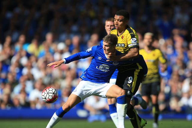 Everton’s John Stones, left, produced a typically composed performance against Watford